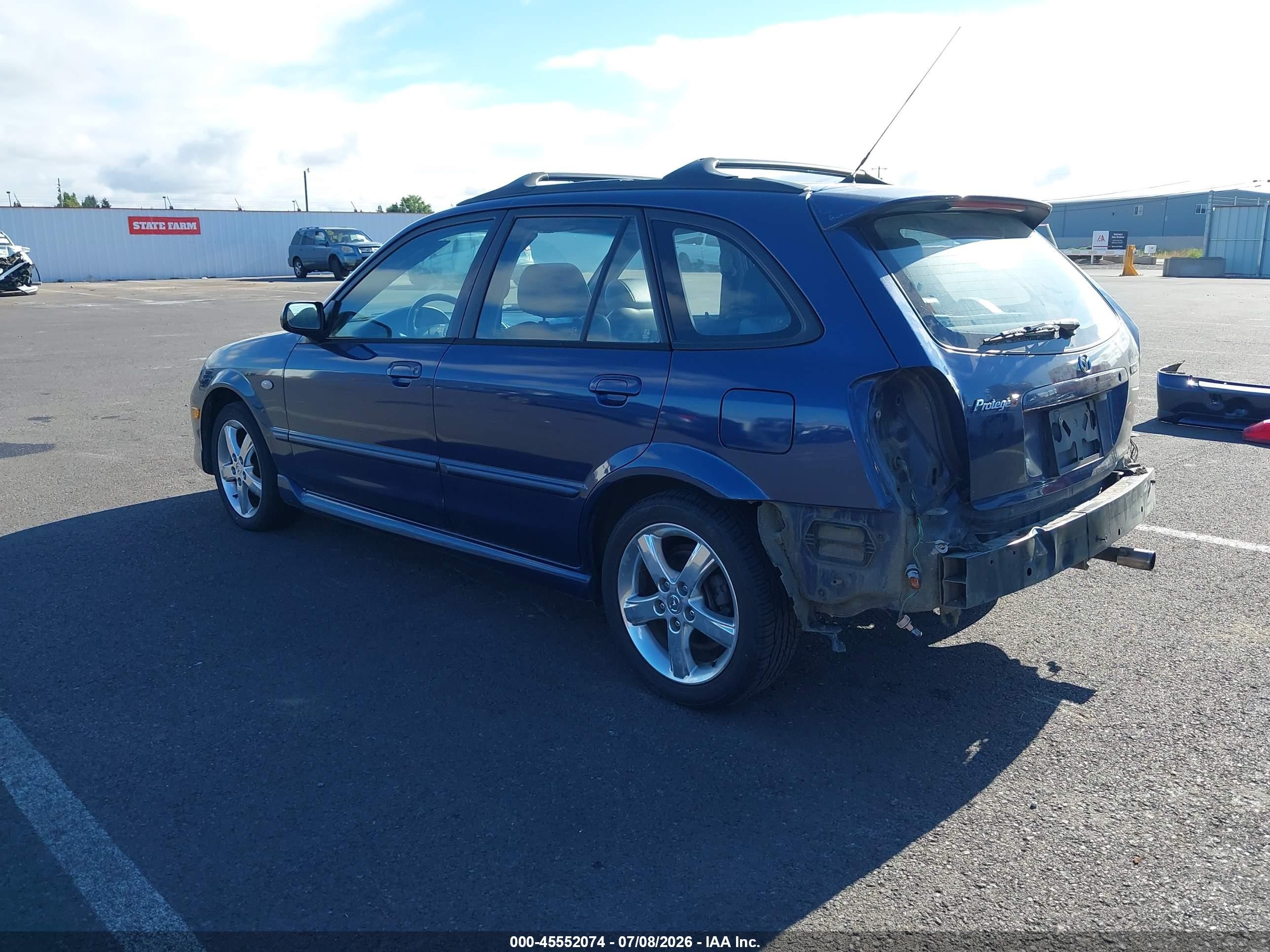 2003 Mazda Protege5   Синий vin: JM1BJ246631128127