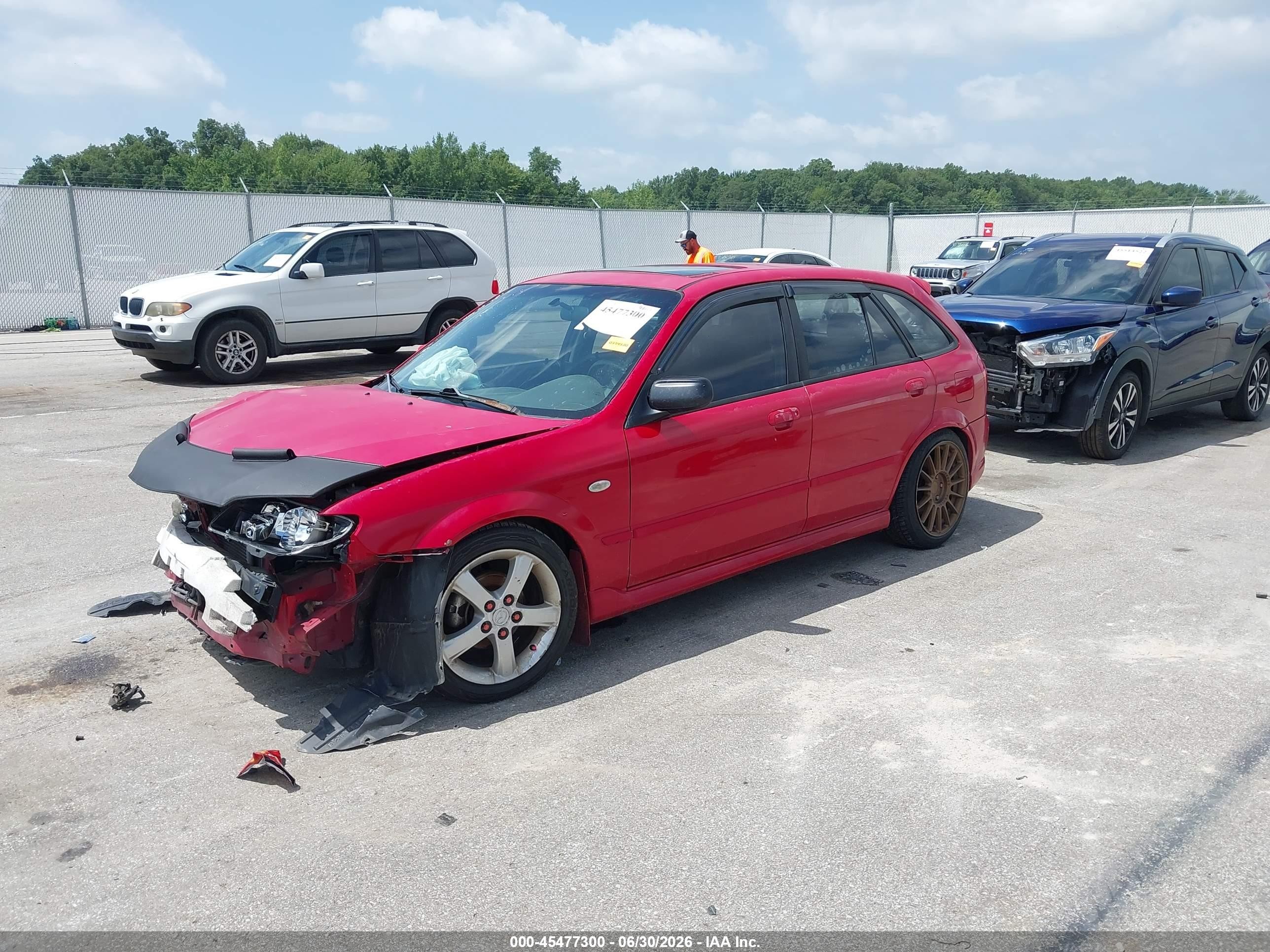 2003 Mazda Protege5   Red vin: JM1BJ246831210909