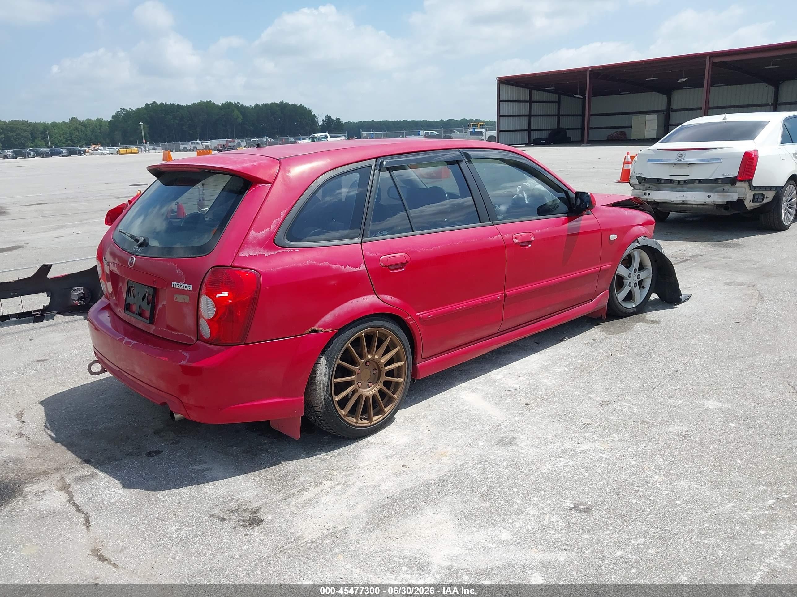 2003 Mazda Protege5   Red vin: JM1BJ246831210909