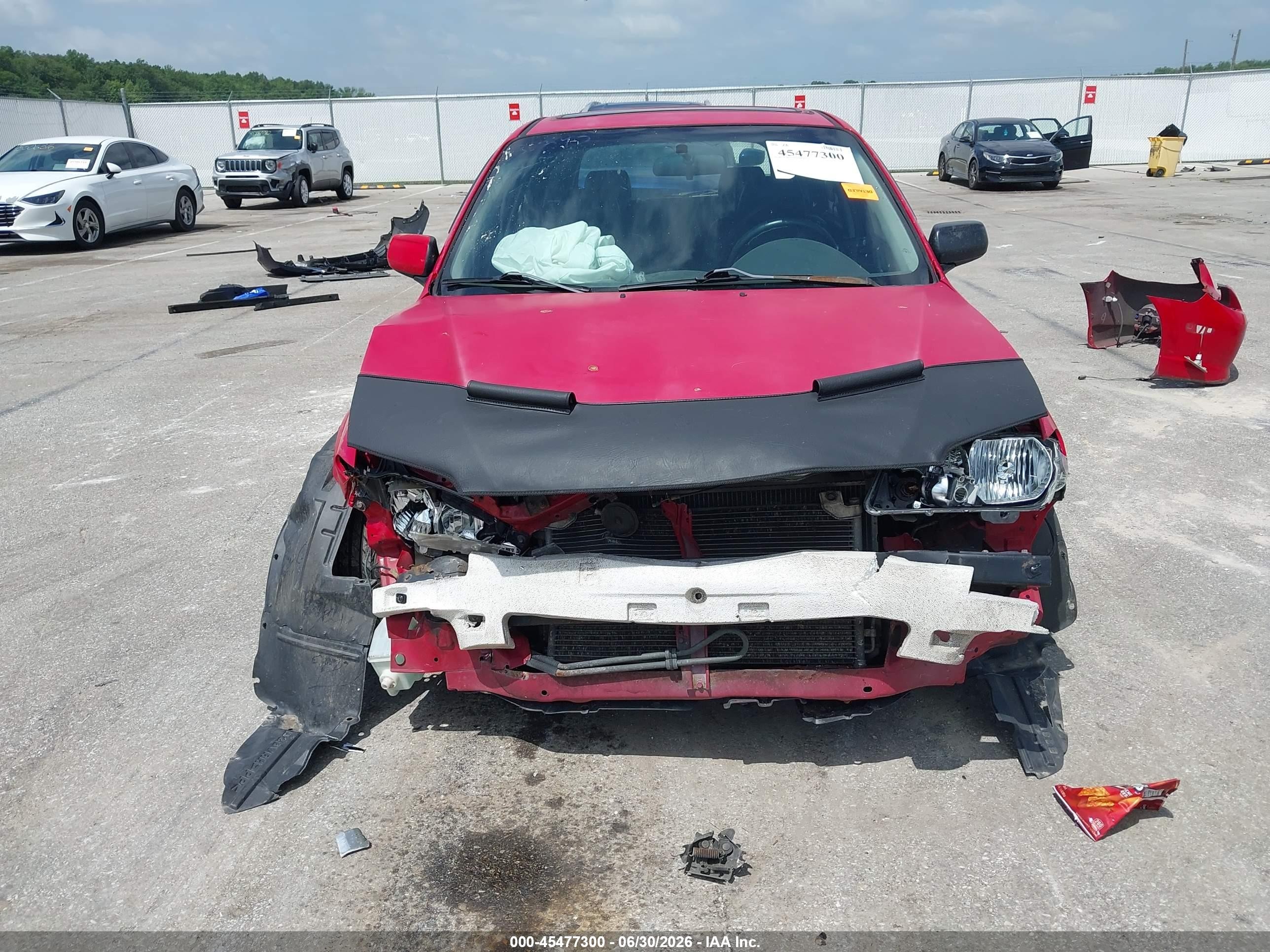 2003 Mazda Protege5   Red vin: JM1BJ246831210909