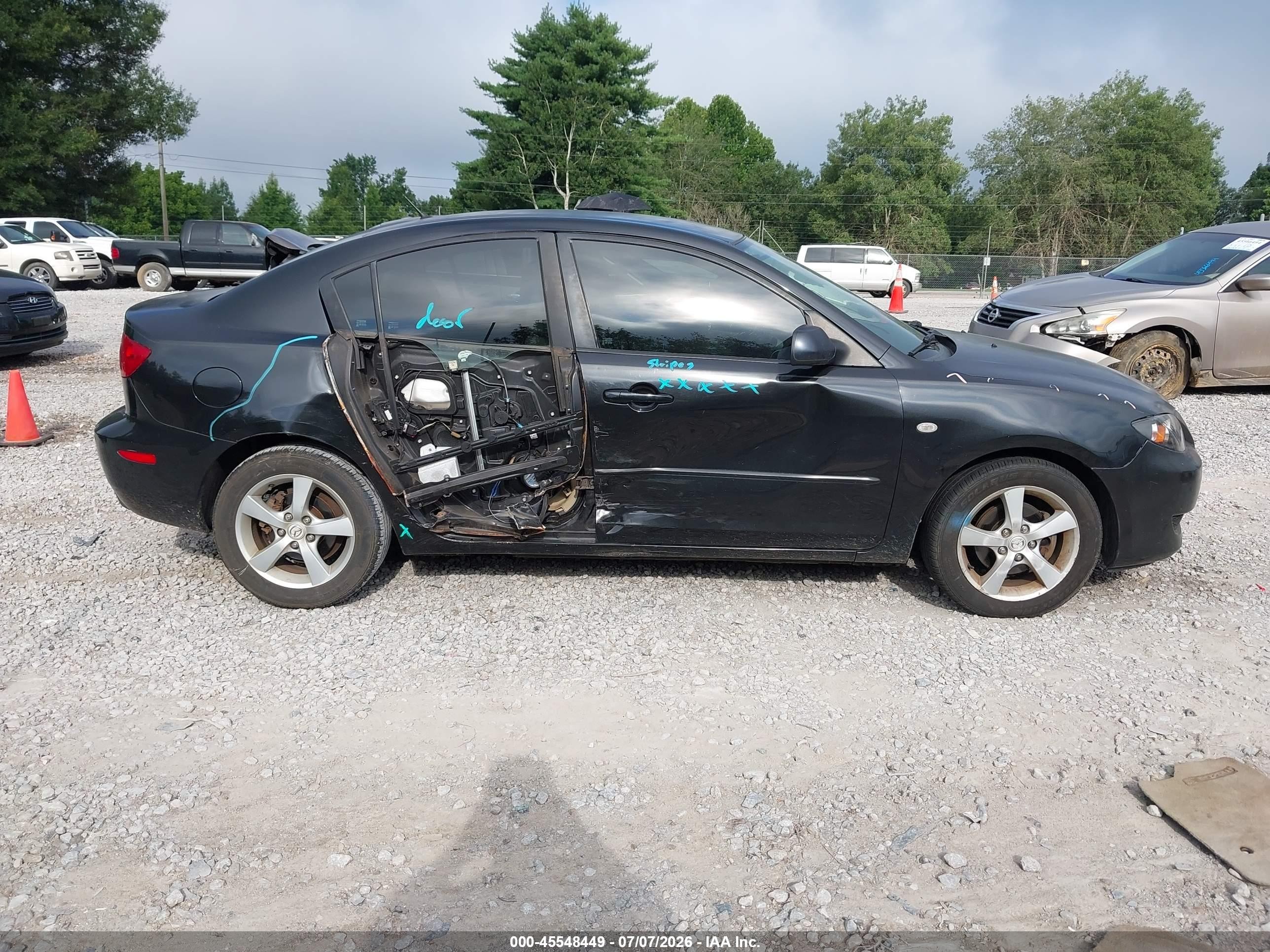 2006 Mazda Mazda3 I Touring Black vin: JM1BK12F261450438