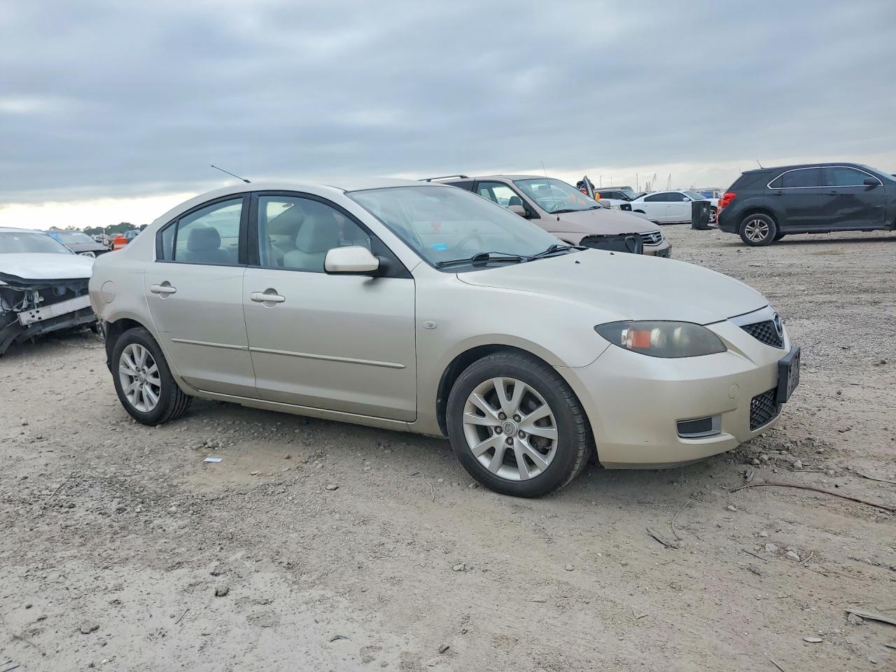 2008 Mazda 3 I Tan vin: JM1BK12F481796235