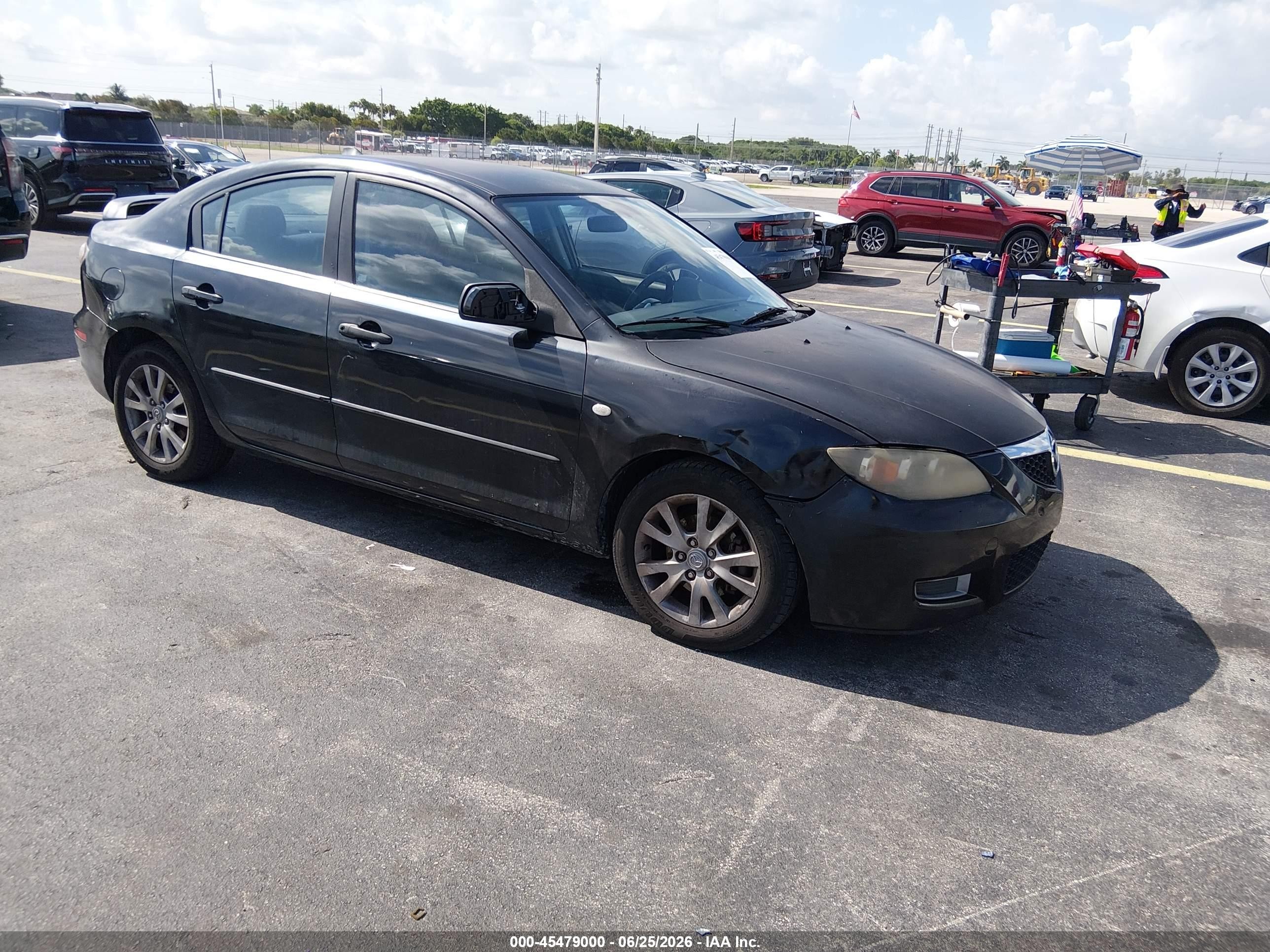 2007 Mazda Mazda3 I Black vin: JM1BK12F771734813