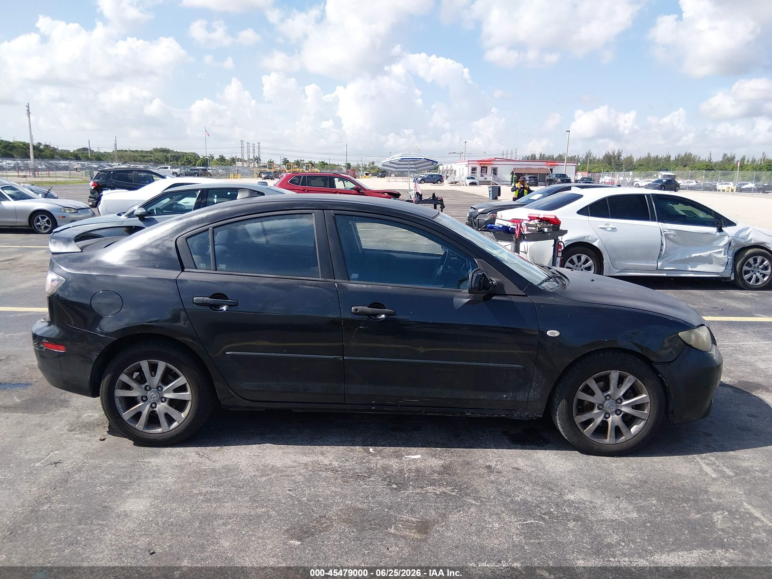 2007 Mazda Mazda3 I Black vin: JM1BK12F771734813