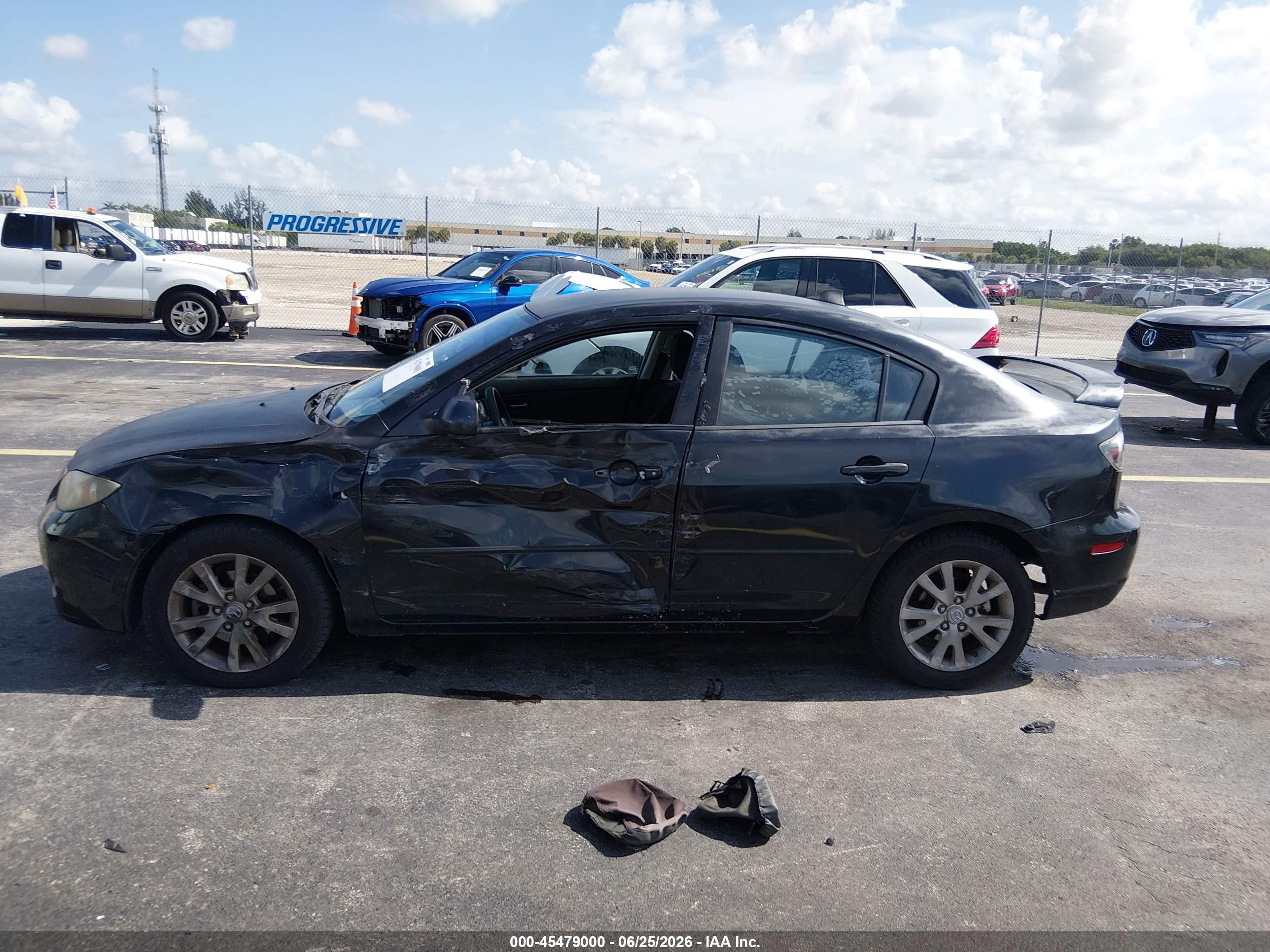 2007 Mazda Mazda3 I Black vin: JM1BK12F771734813