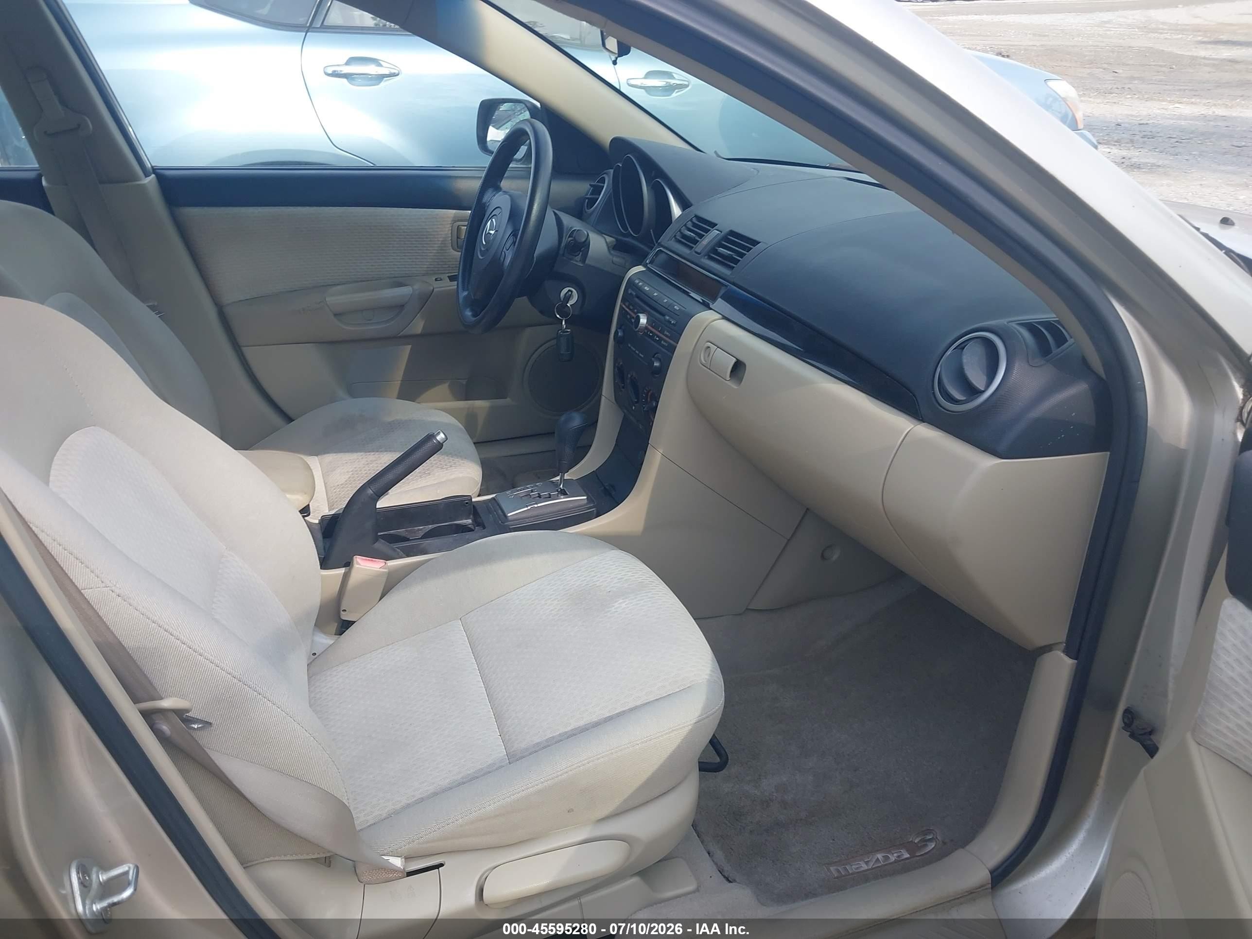 2006 Mazda Mazda3 I Touring Tan vin: JM1BK12F861463744