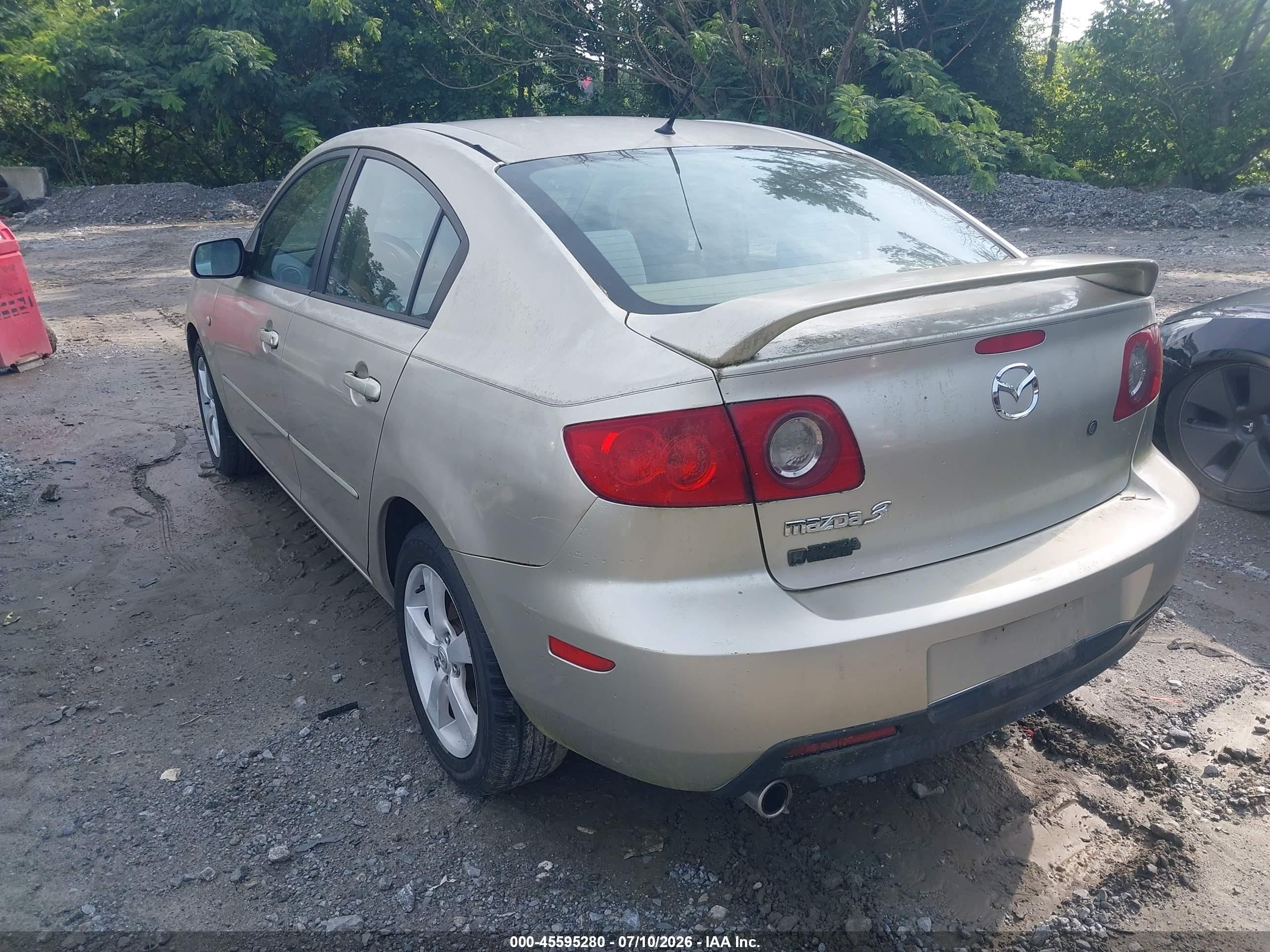 2006 Mazda Mazda3 I Touring Tan vin: JM1BK12F861463744