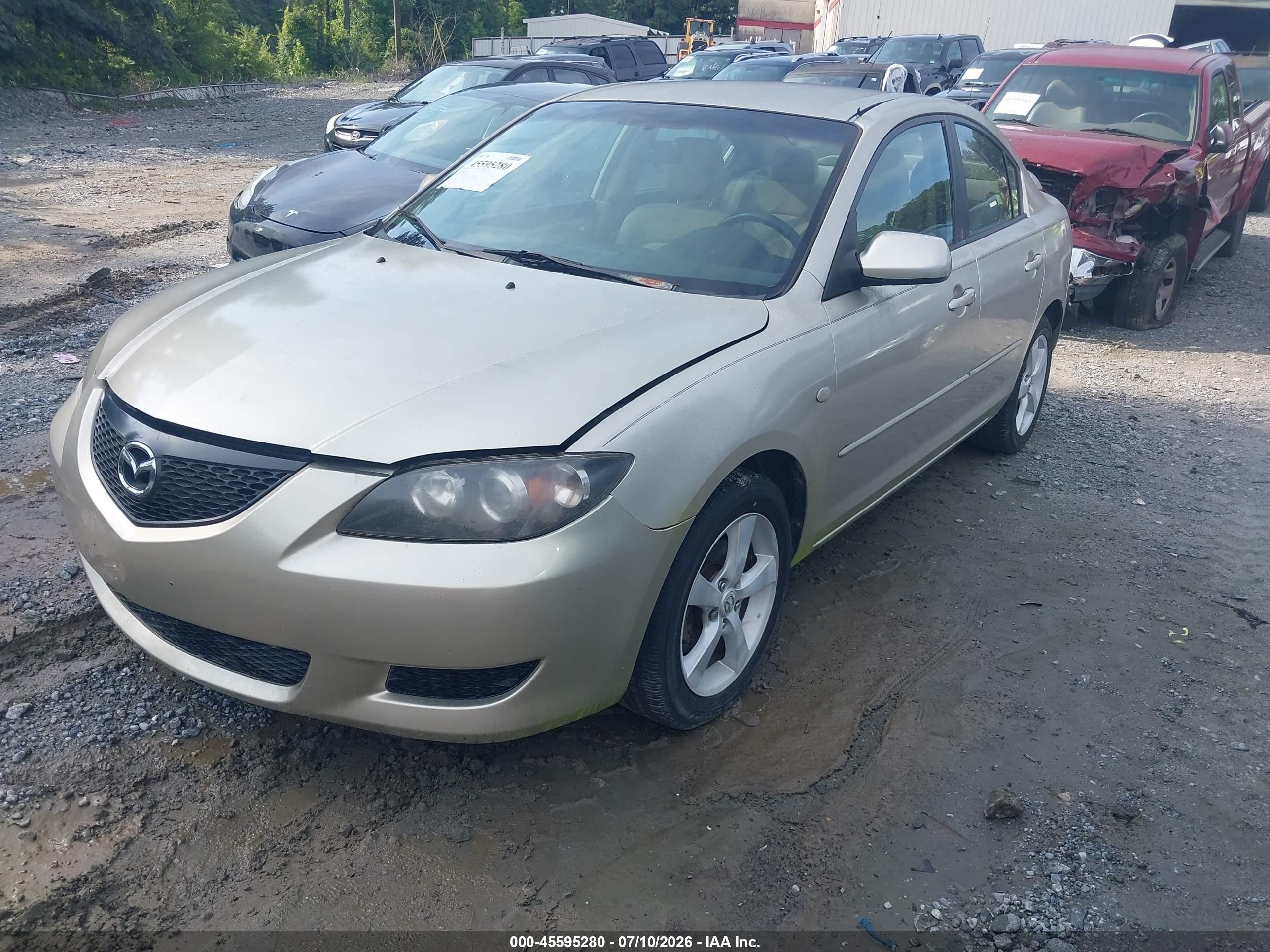 2006 Mazda Mazda3 I Touring Tan vin: JM1BK12F861463744