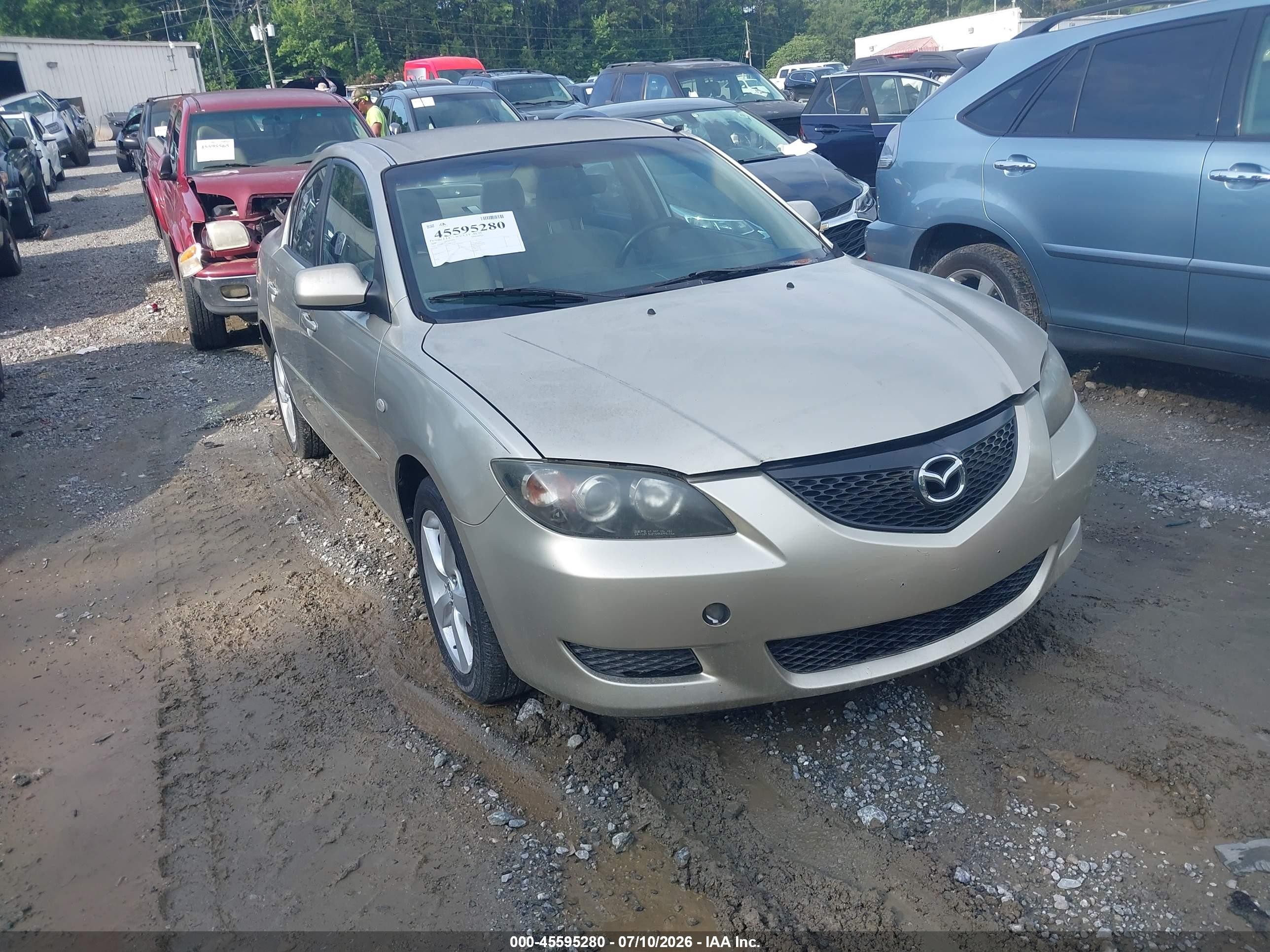 2006 Mazda Mazda3 I Touring Tan vin: JM1BK12F861463744