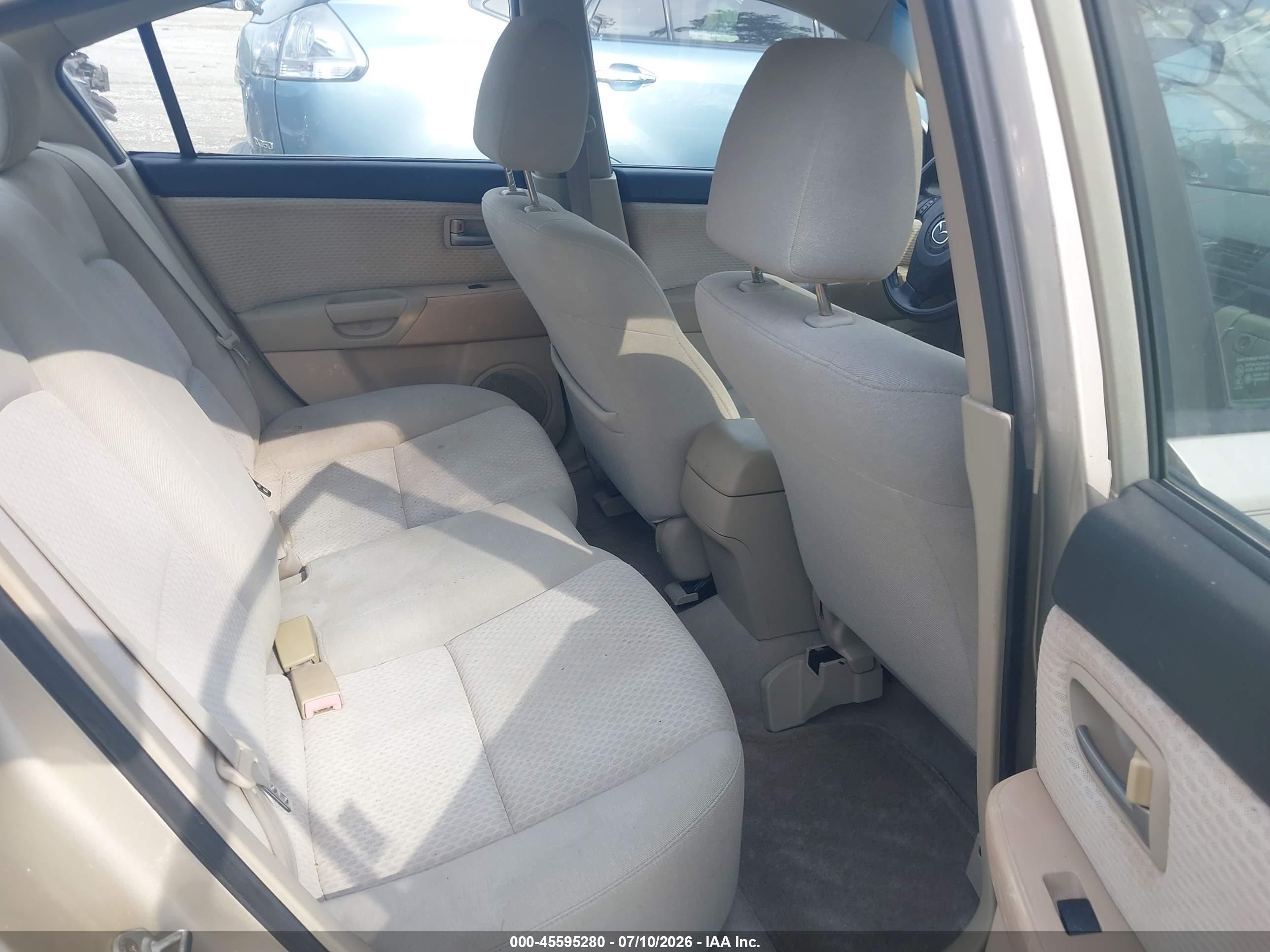 2006 Mazda Mazda3 I Touring Tan vin: JM1BK12F861463744