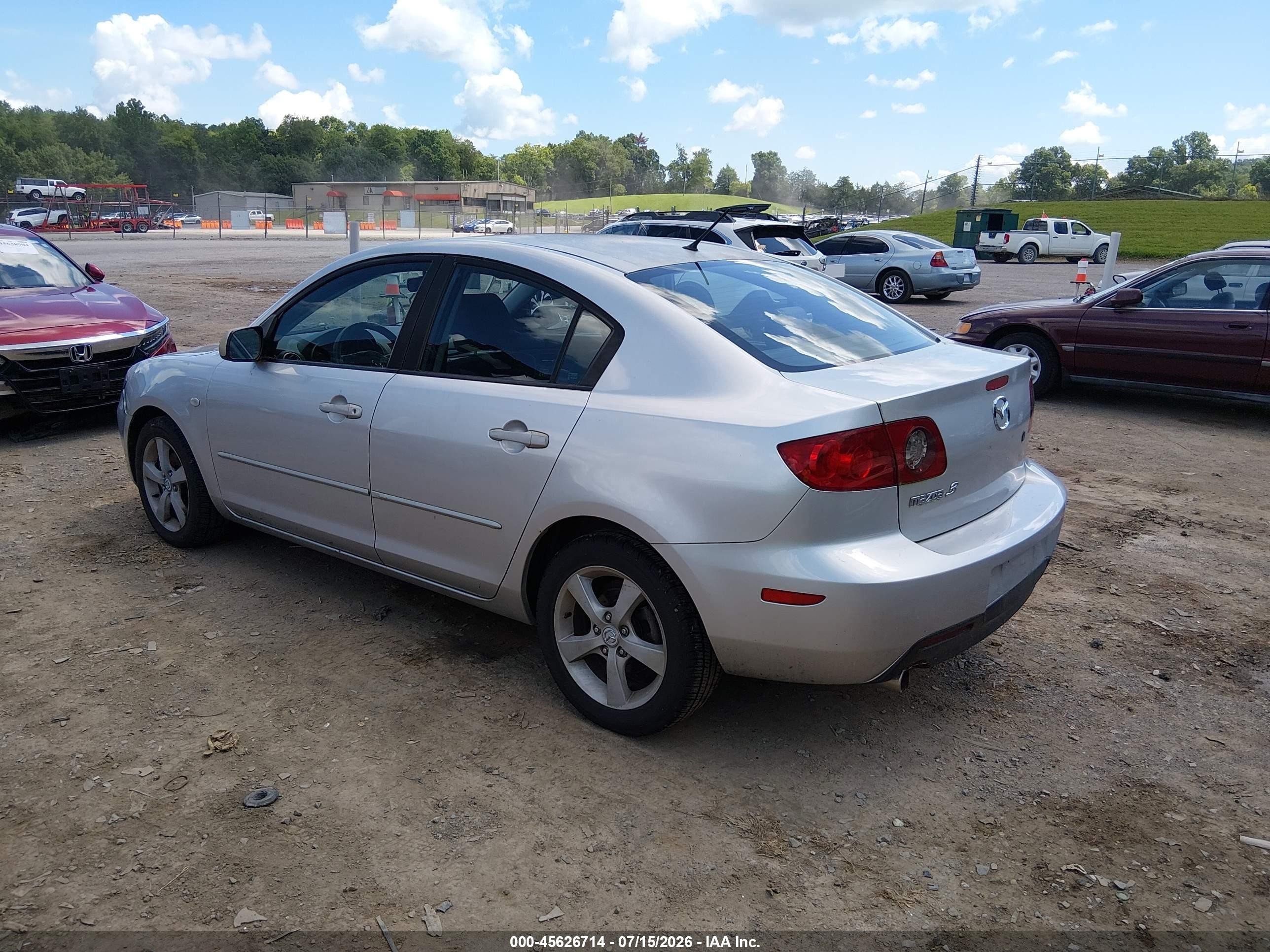 2005 Mazda Mazda3 I Серебряный vin: JM1BK12F951306058
