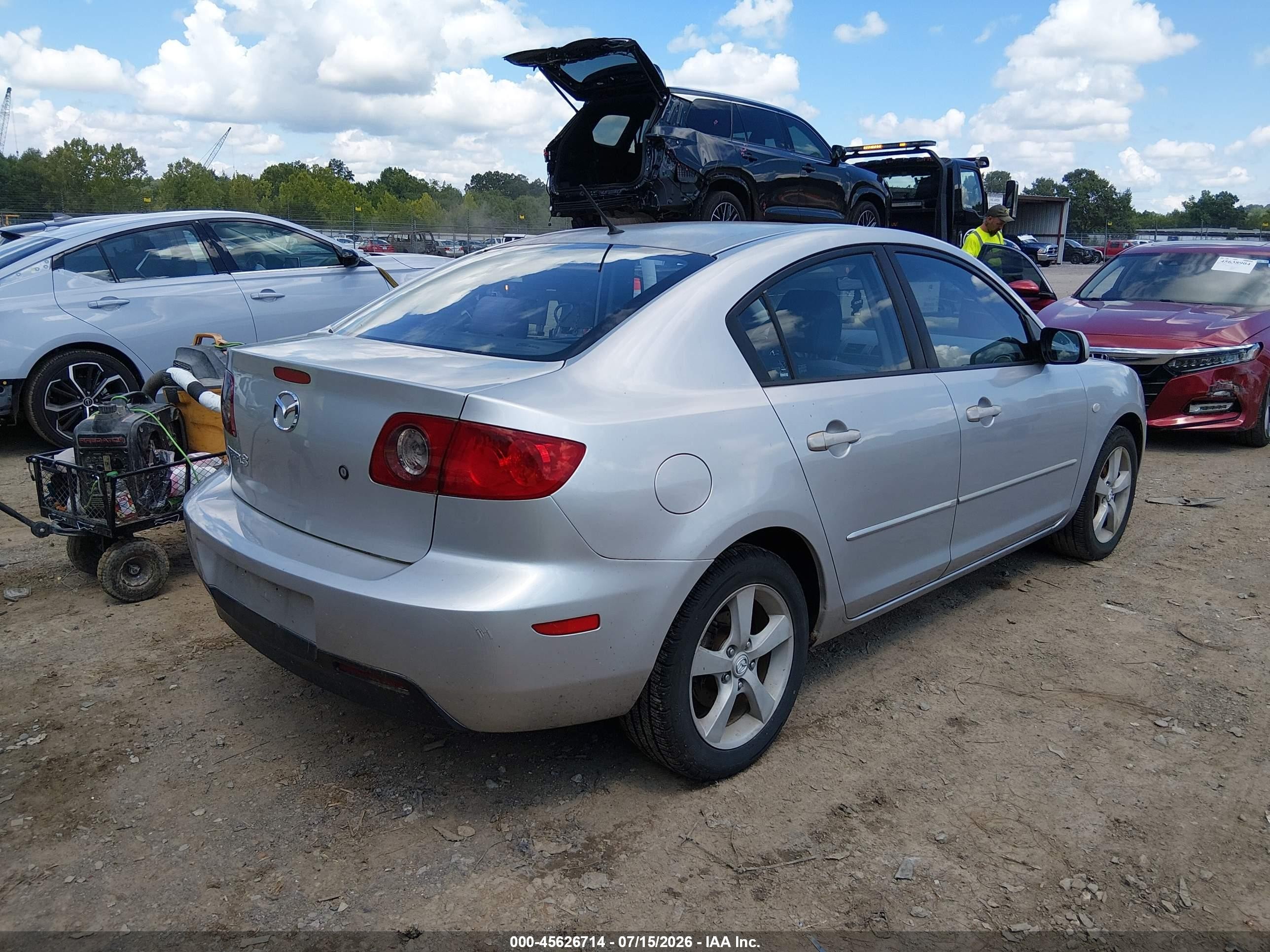 2005 Mazda Mazda3 I Серебряный vin: JM1BK12F951306058