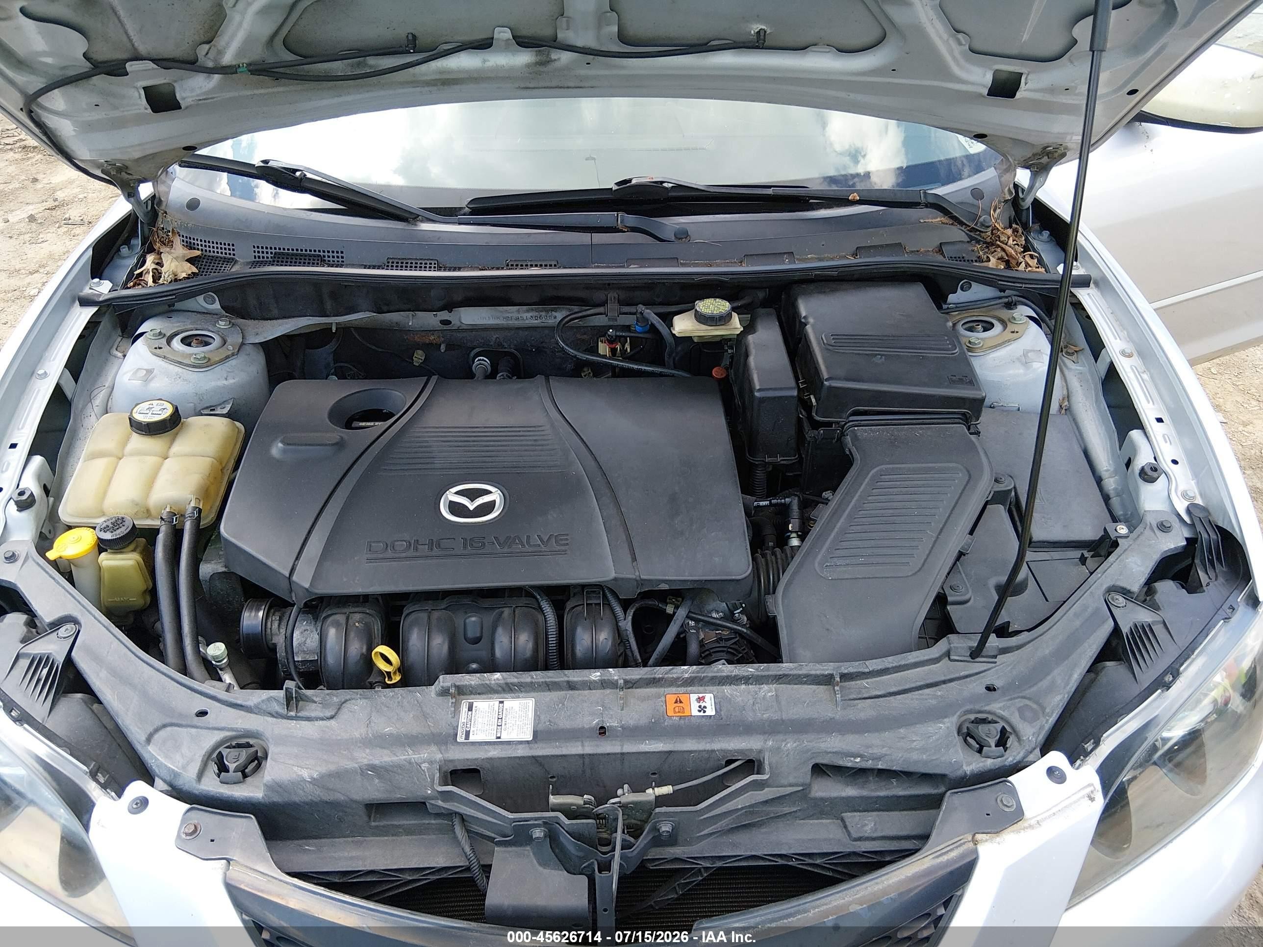 2005 Mazda Mazda3 I Серебряный vin: JM1BK12F951306058