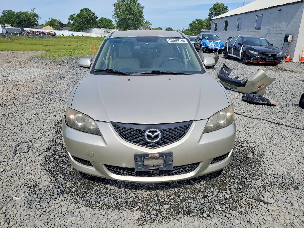 2005 Mazda 3 I Gold vin: JM1BK12F951332398