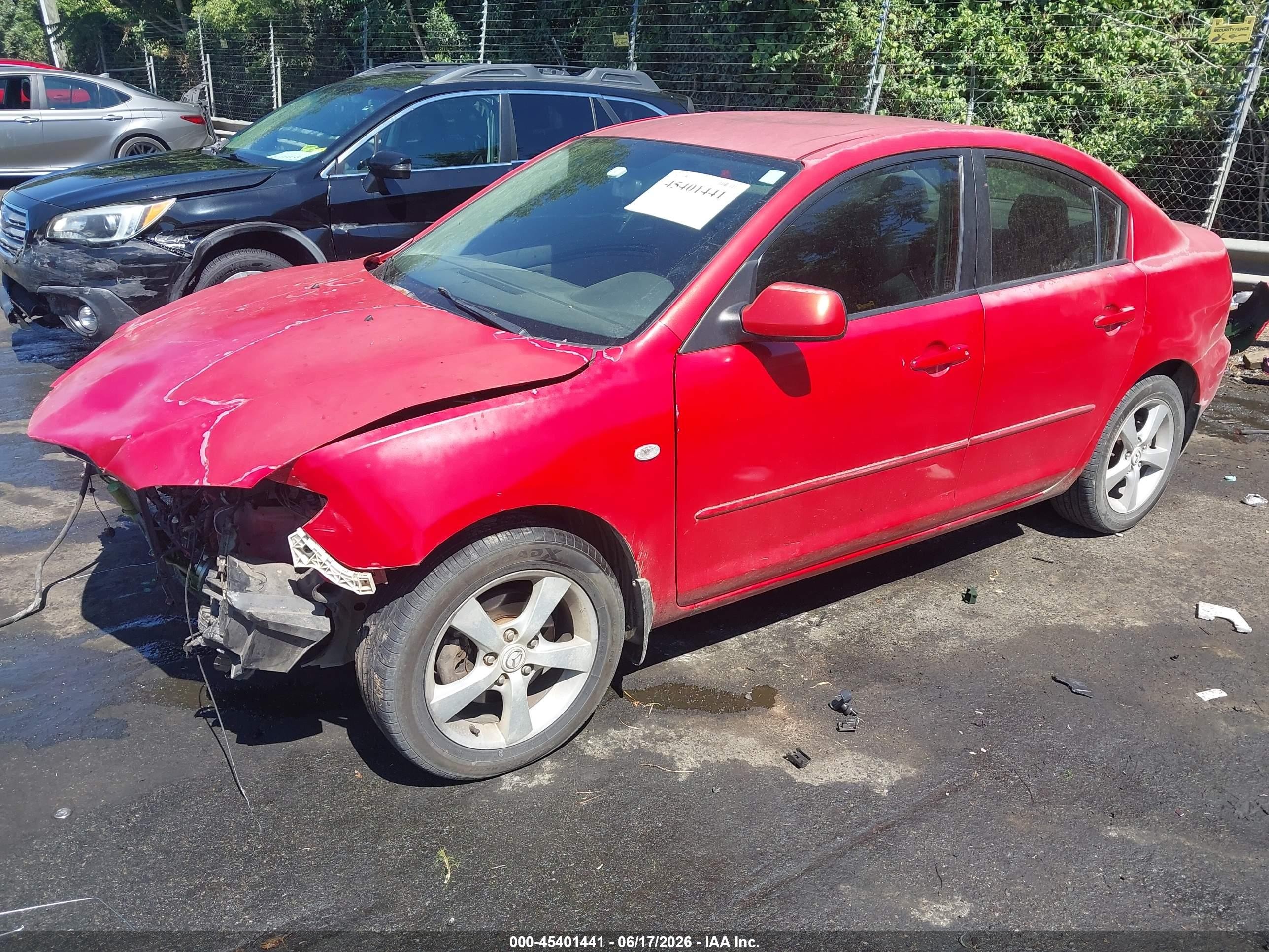 2006 Mazda Mazda3 I Touring Red vin: JM1BK12FX61501992