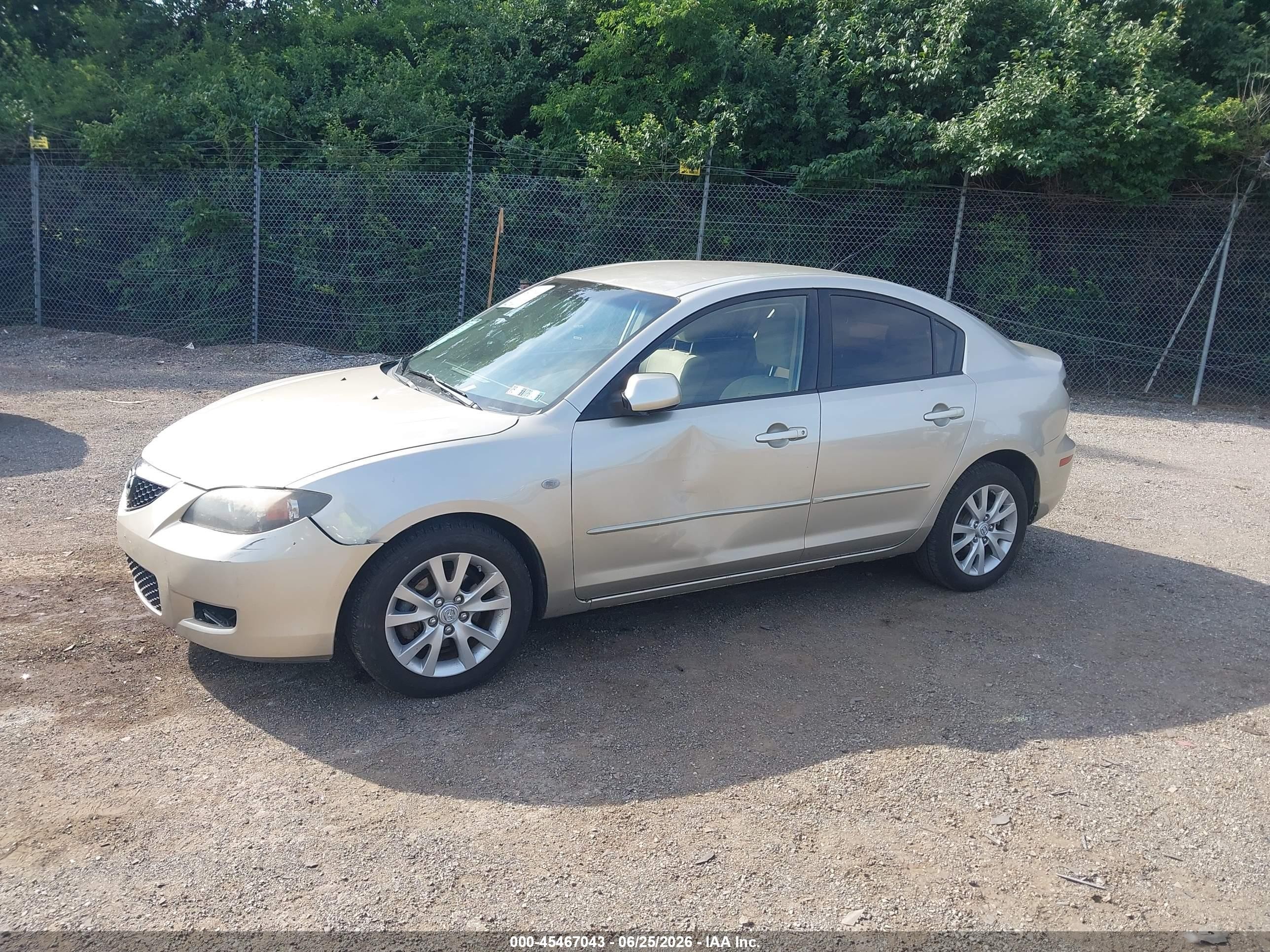 2007 Mazda Mazda3 I Tan vin: JM1BK12FX71711493