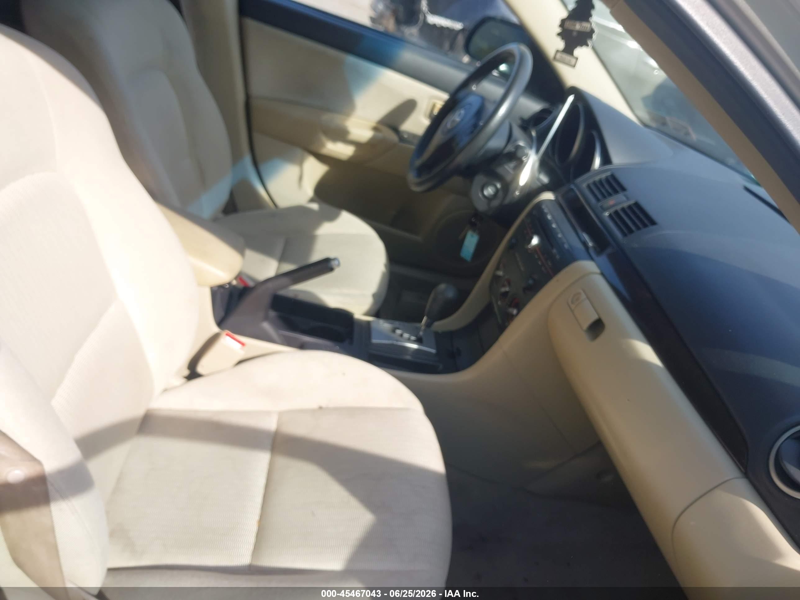2007 Mazda Mazda3 I Tan vin: JM1BK12FX71711493