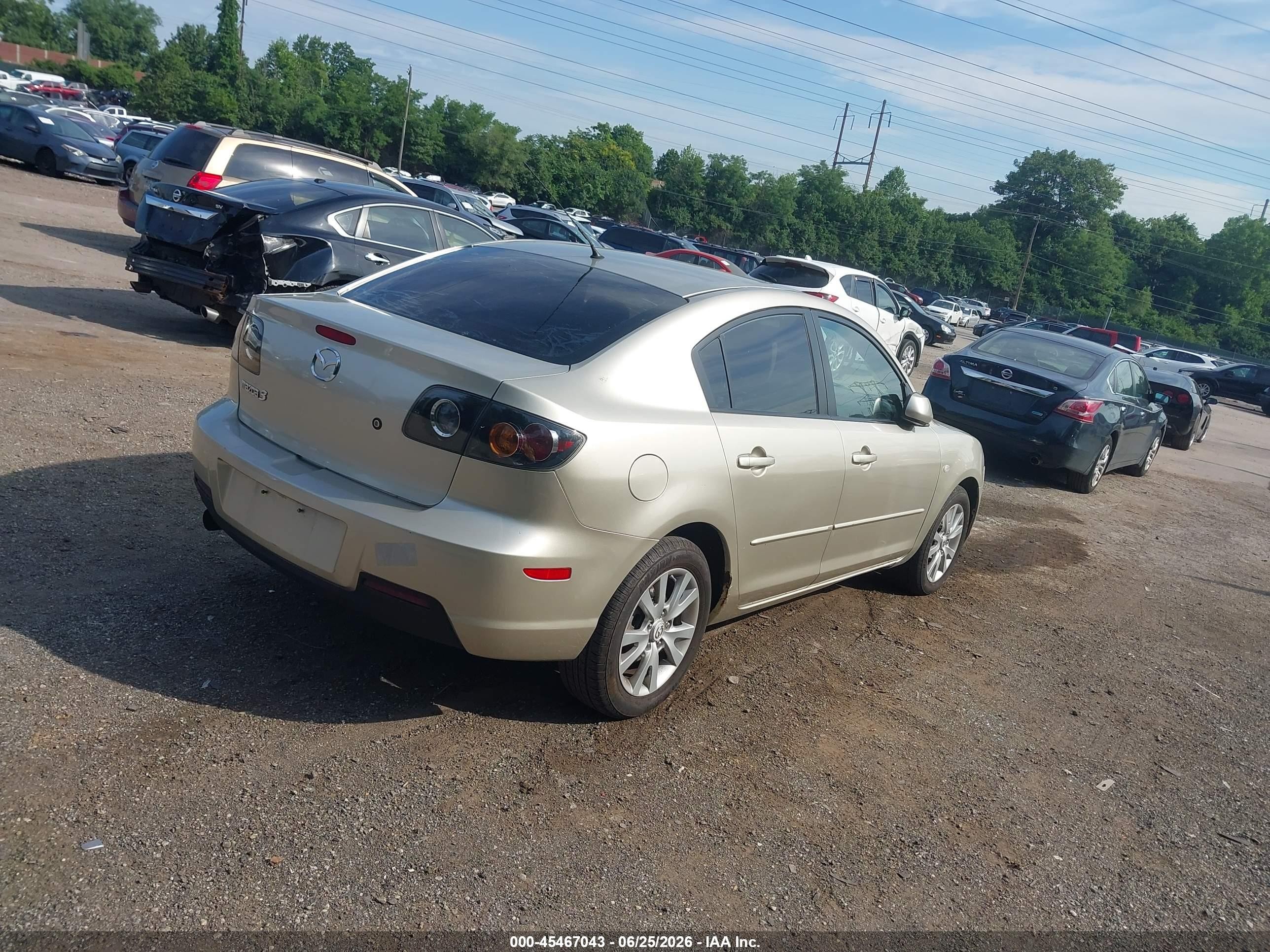 2007 Mazda Mazda3 I Tan vin: JM1BK12FX71711493