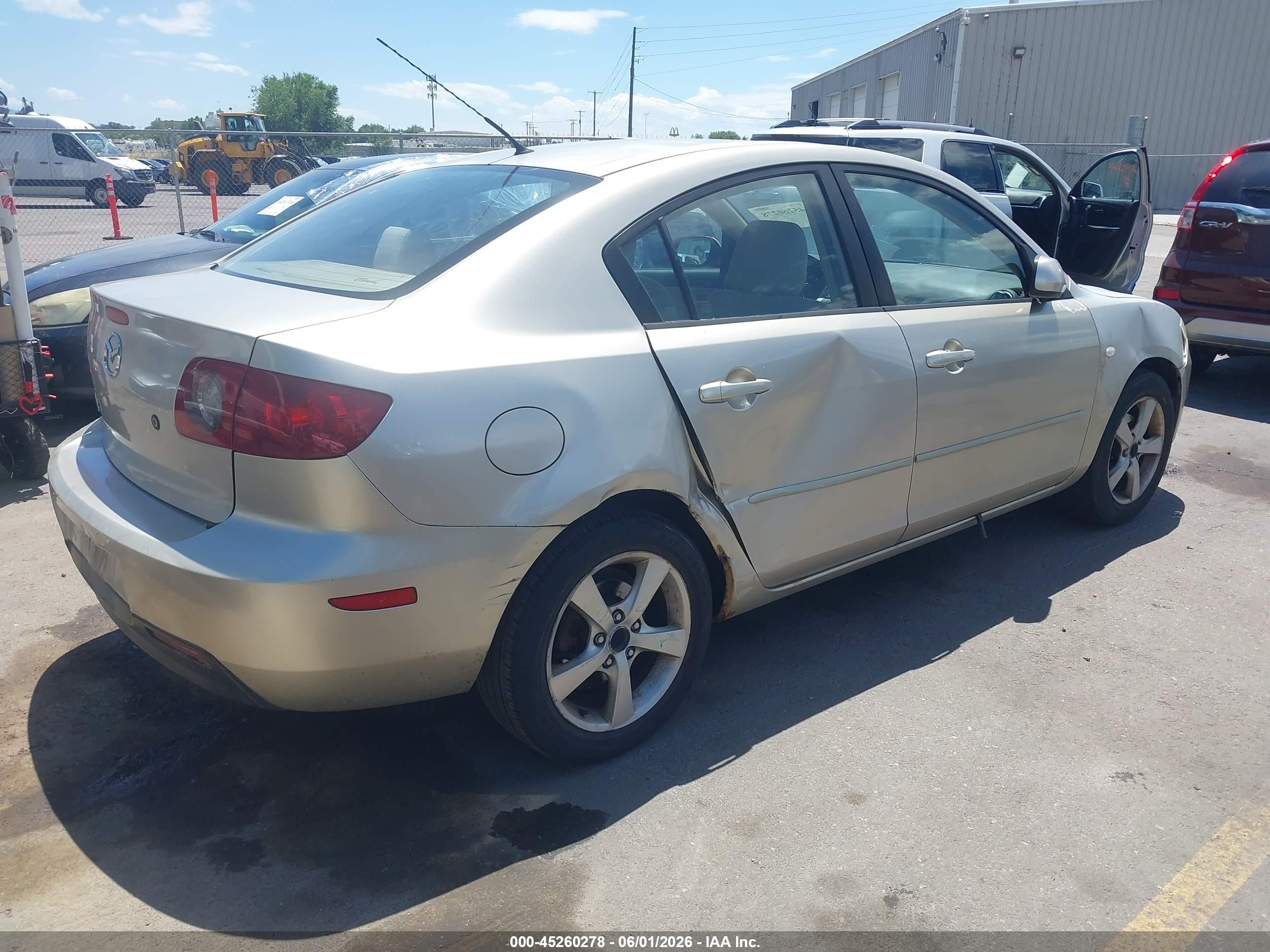 2006 Mazda Mazda3 I Gold vin: JM1BK12G361542571