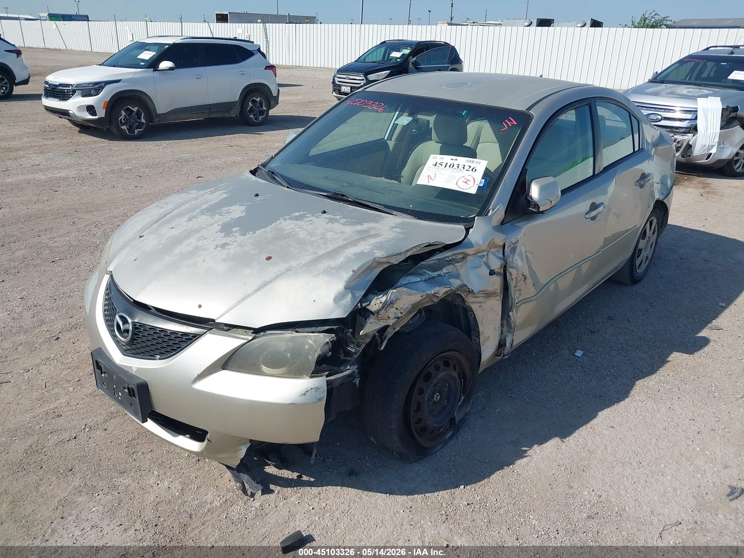 2006 Mazda Mazda3 I Gold vin: JM1BK12G761534179