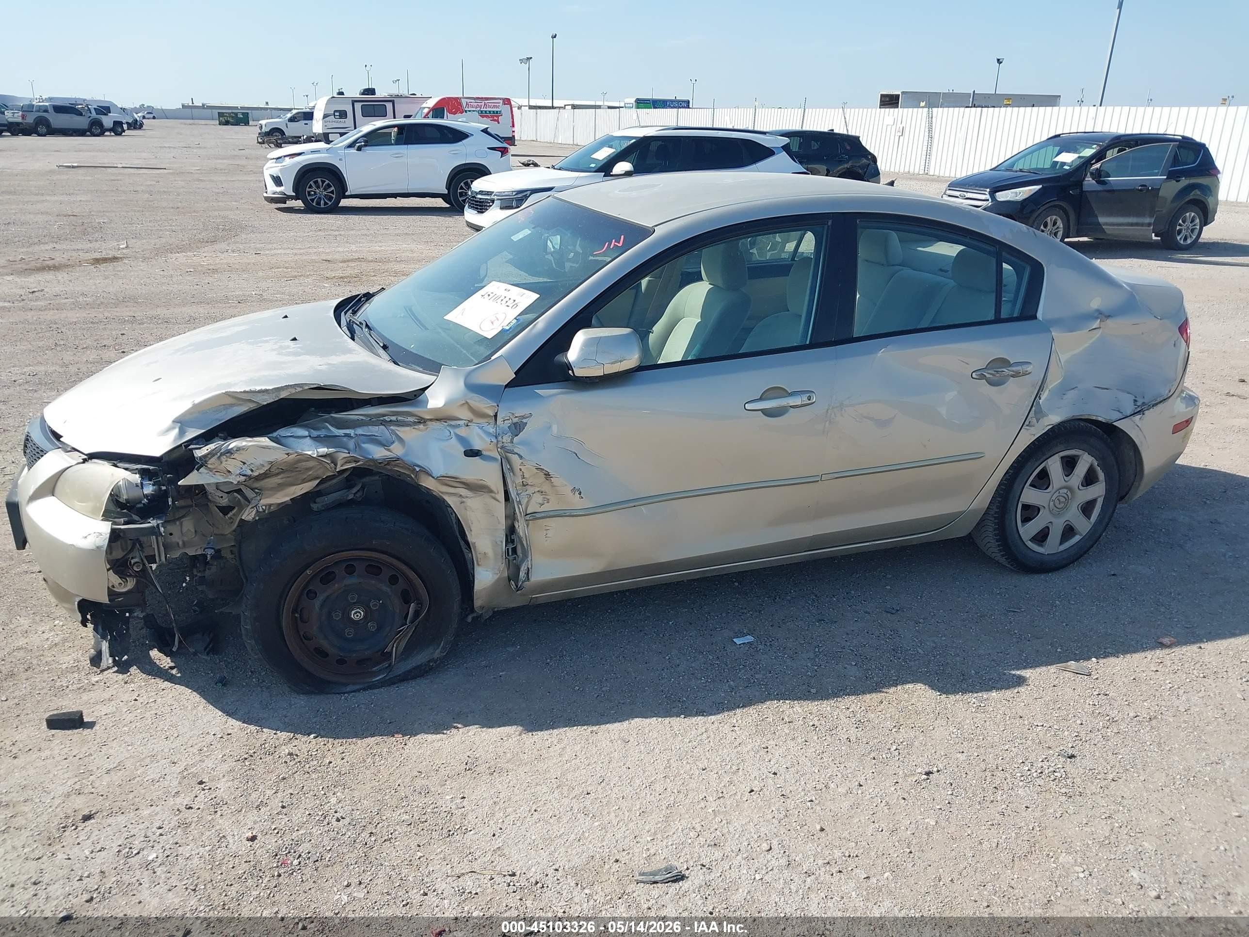 2006 Mazda Mazda3 I Gold vin: JM1BK12G761534179