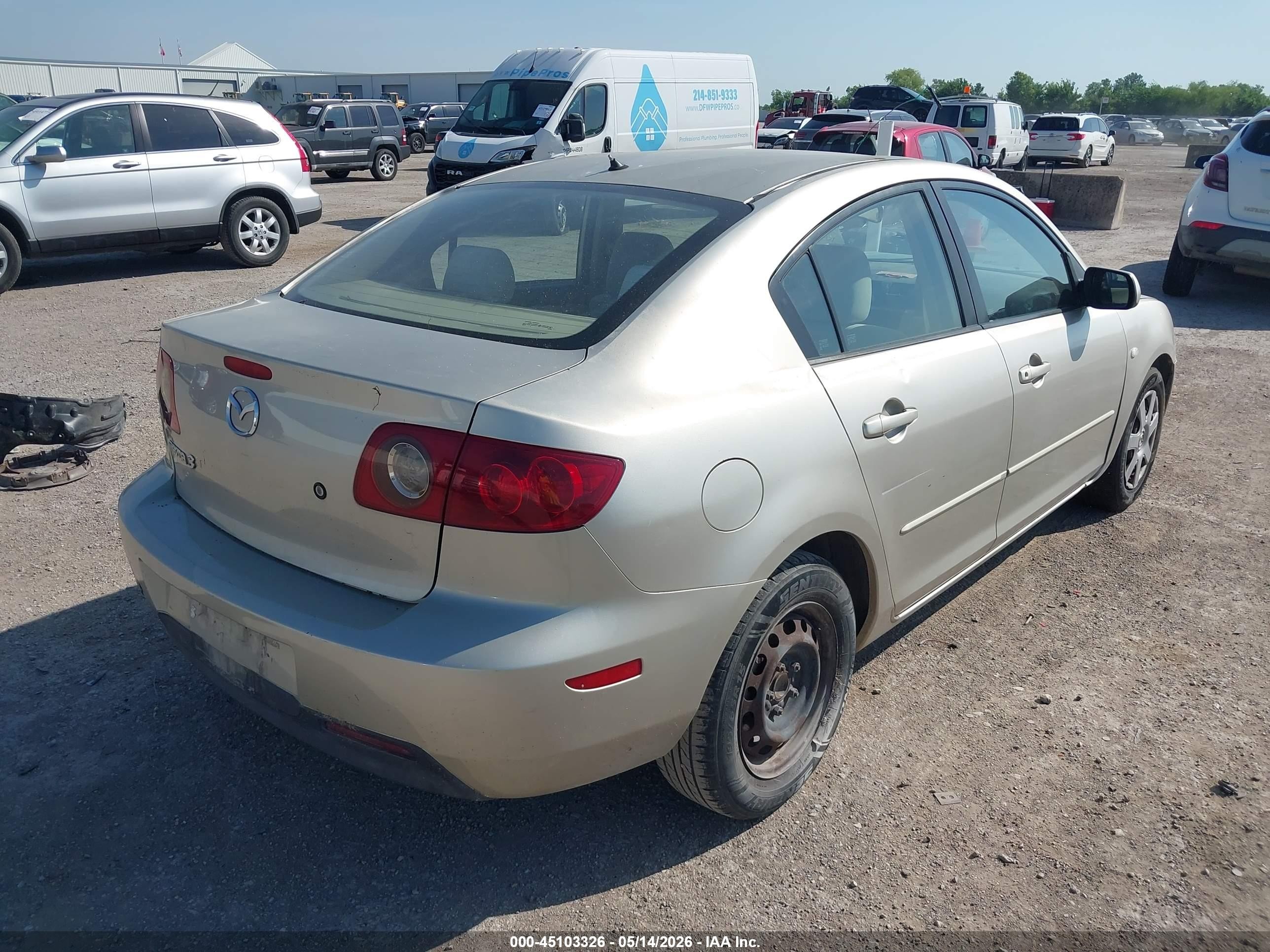 2006 Mazda Mazda3 I Gold vin: JM1BK12G761534179