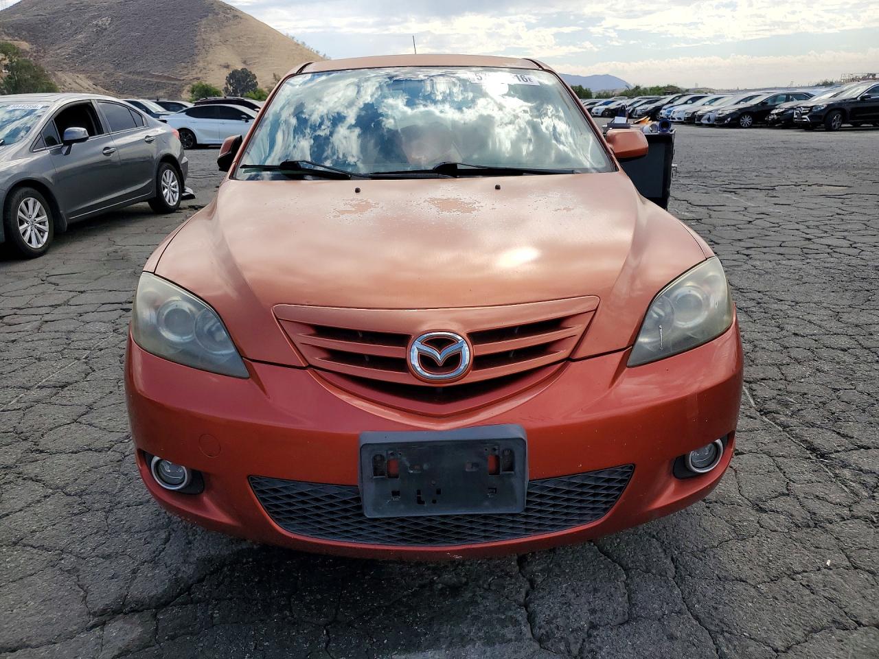 2005 Mazda 3 Hatchback Оранжевый vin: JM1BK143051298628