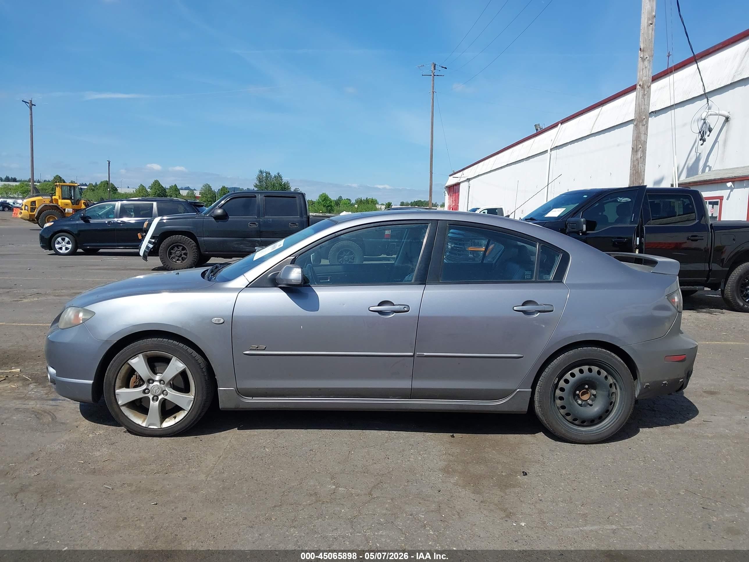 2004 Mazda Mazda3 S Silver vin: JM1BK323041191592