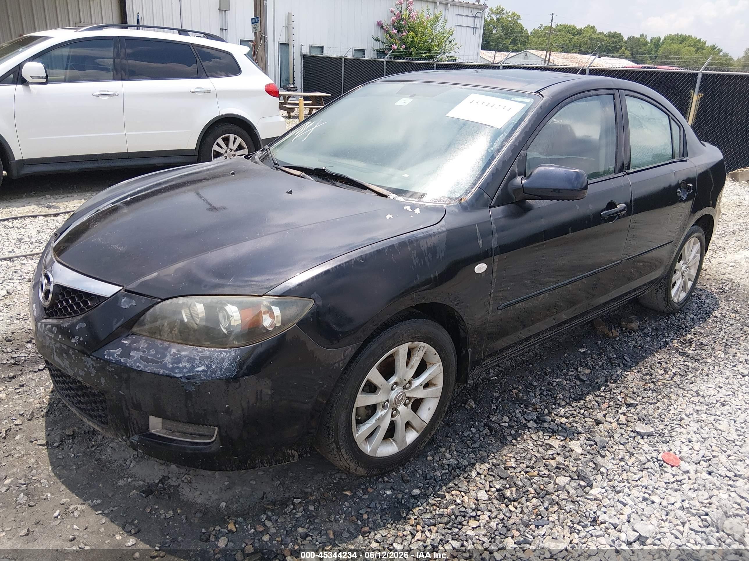 2007 Mazda Mazda3 I Black vin: JM1BK32F171694885