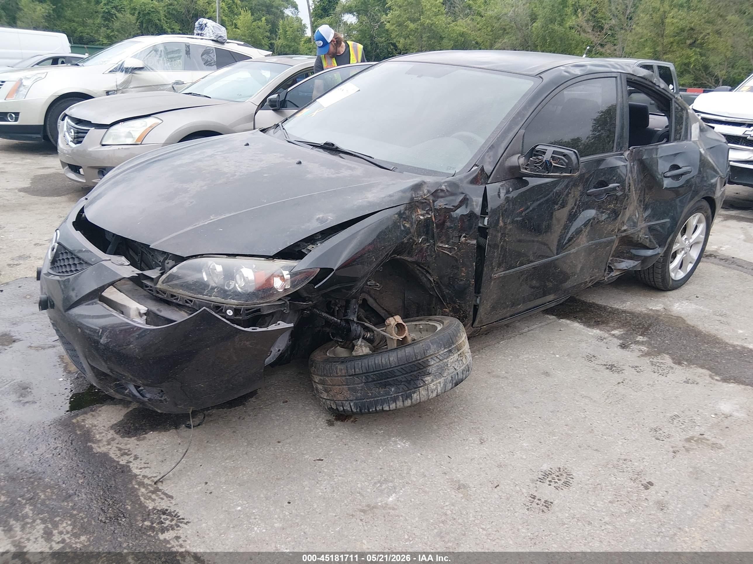 2009 Mazda Mazda3 I Black vin: JM1BK32F191197208