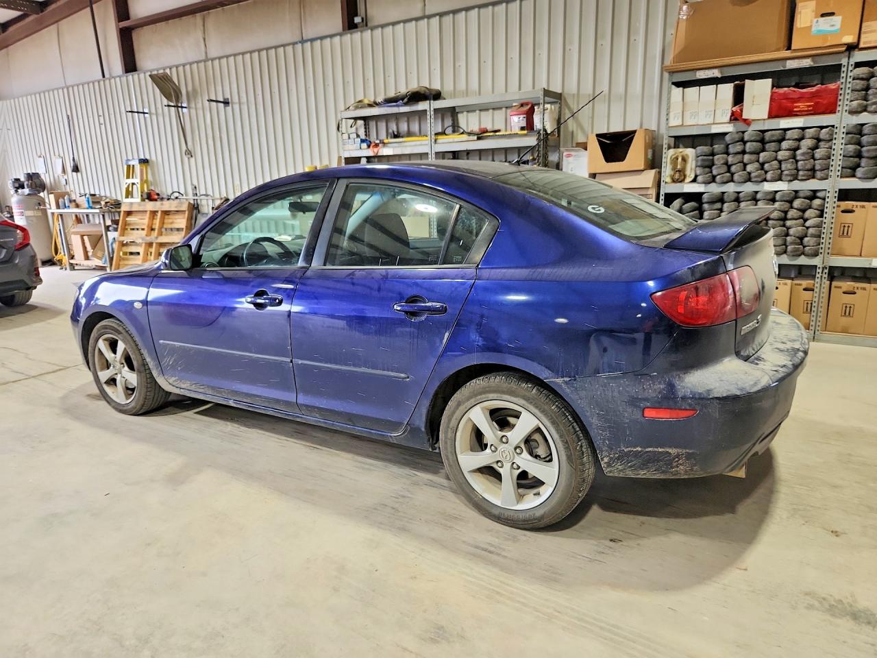 2006 Mazda 3 I Blue vin: JM1BK32F261484004