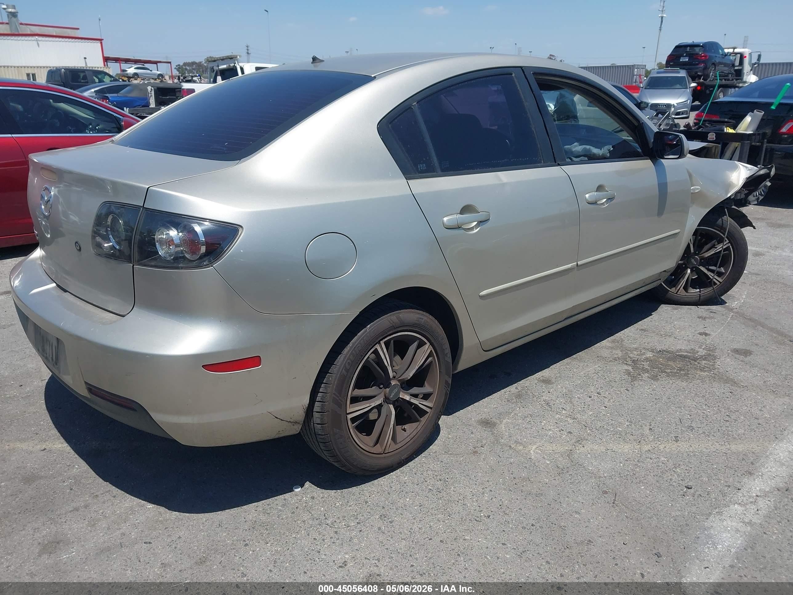 2007 Mazda Mazda3 I Champagne vin: JM1BK32F271686729