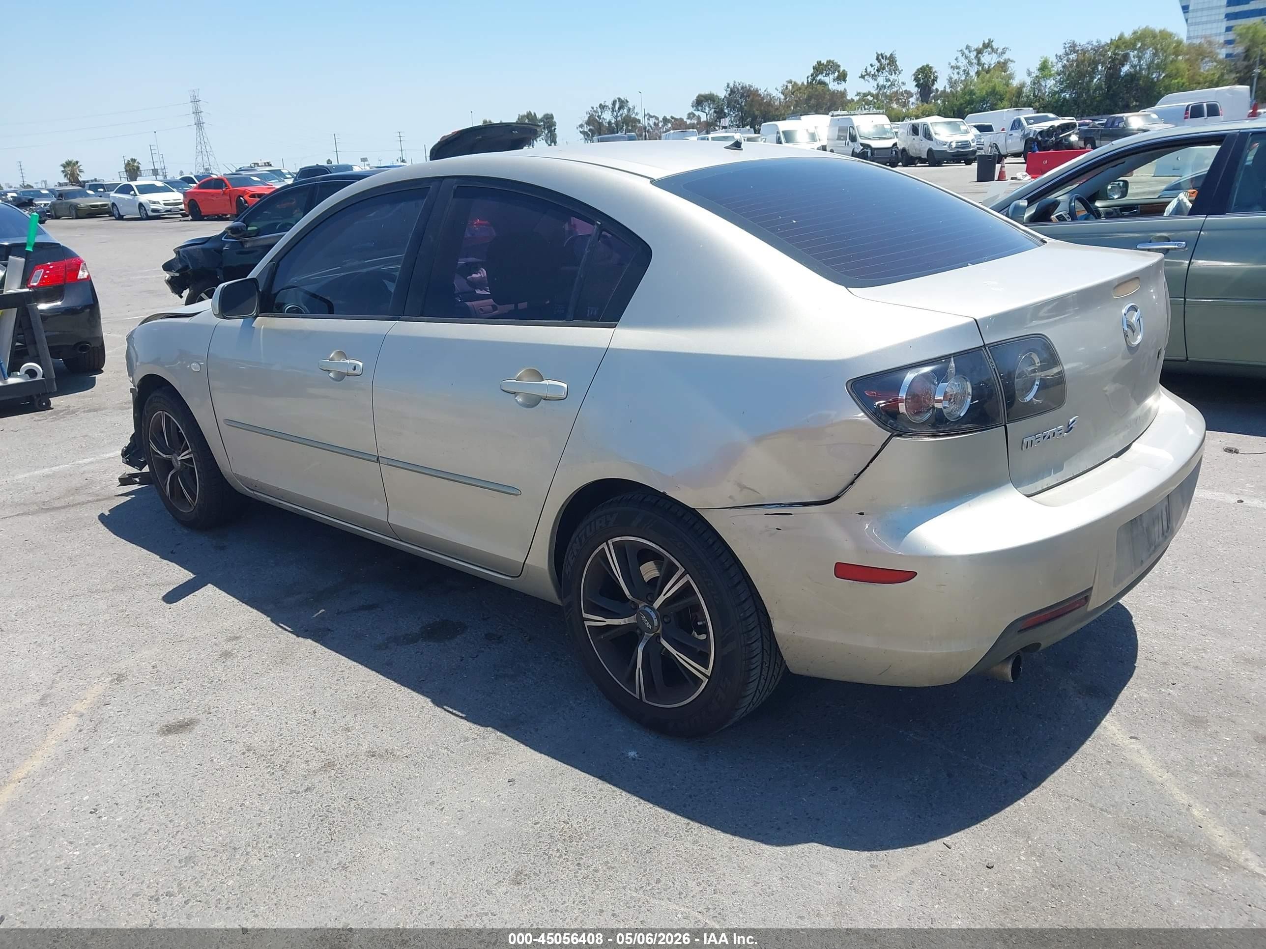 2007 Mazda Mazda3 I Champagne vin: JM1BK32F271686729
