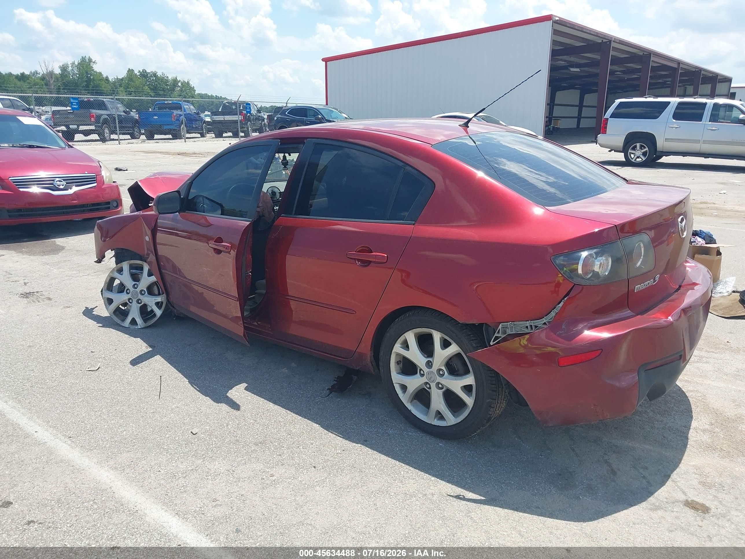 2009 Mazda Mazda3 I Maroon vin: JM1BK32F291224075