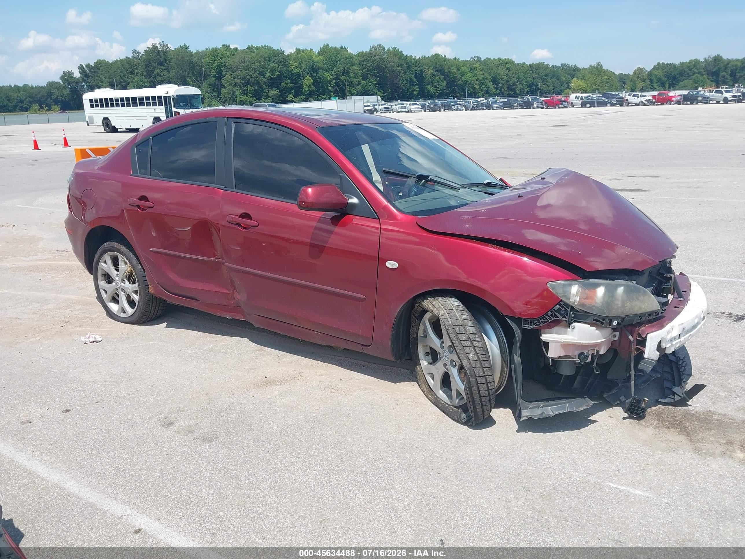 2009 Mazda Mazda3 I Maroon vin: JM1BK32F291224075