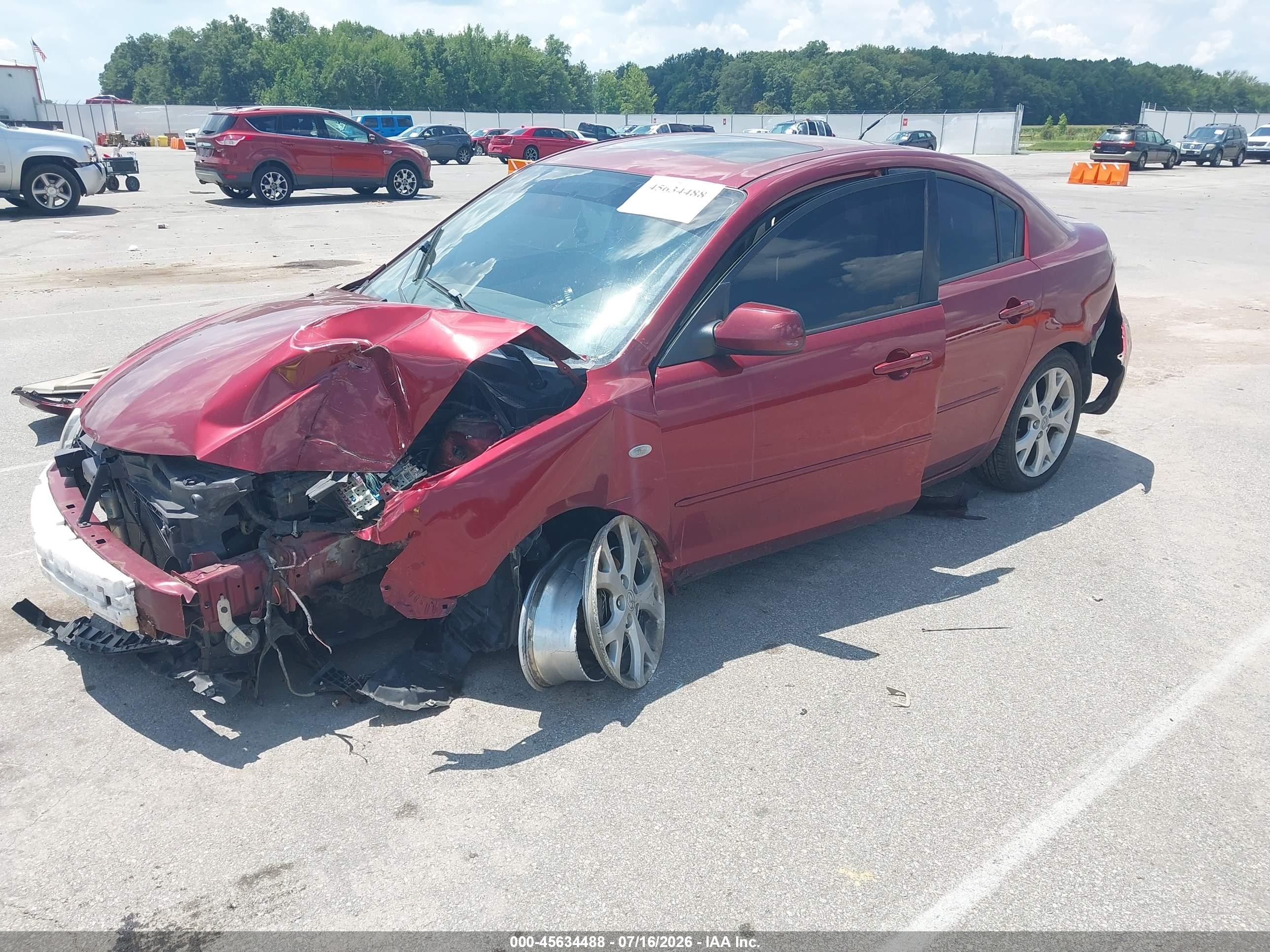 2009 Mazda Mazda3 I Maroon vin: JM1BK32F291224075