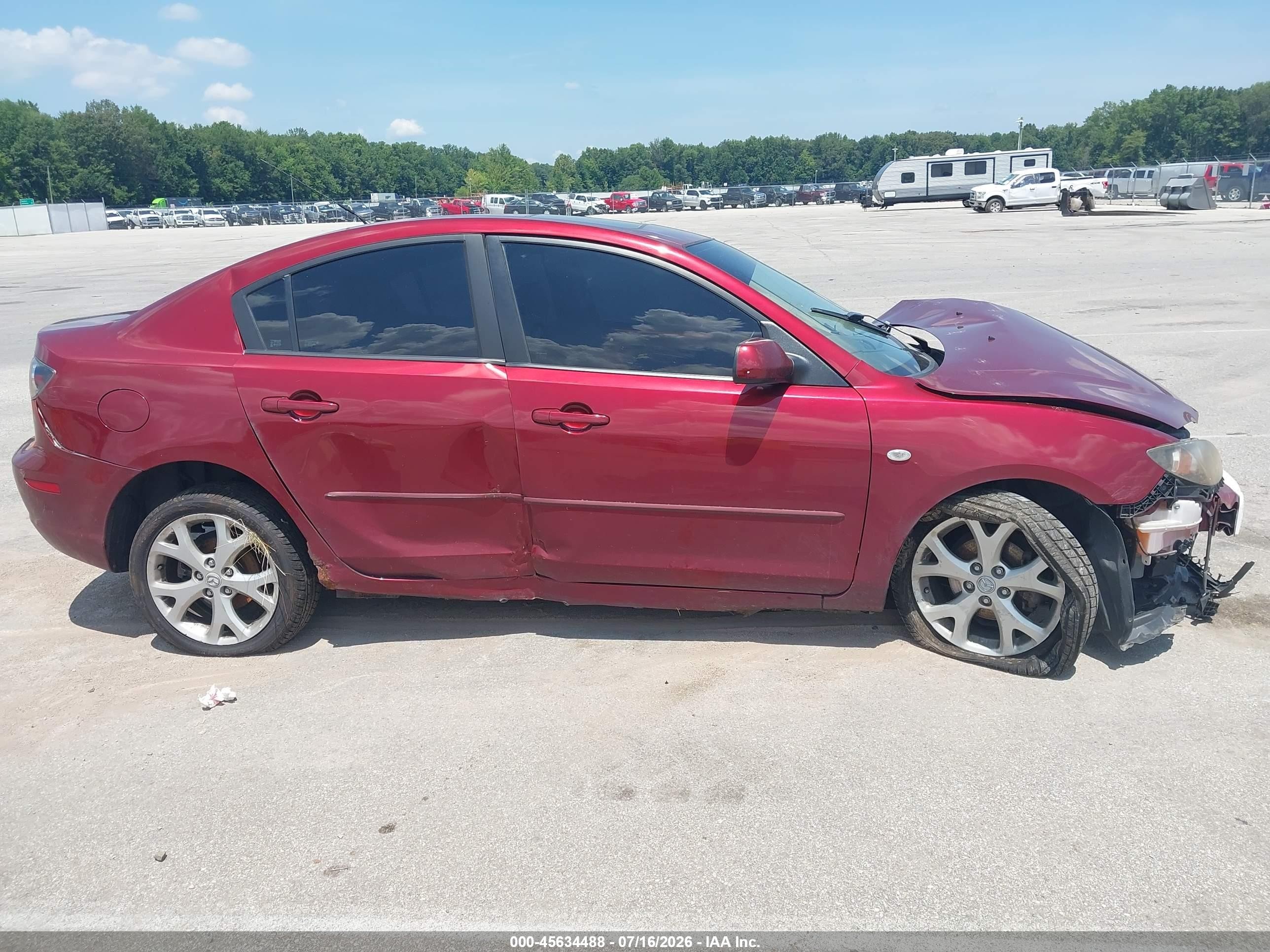 2009 Mazda Mazda3 I Maroon vin: JM1BK32F291224075