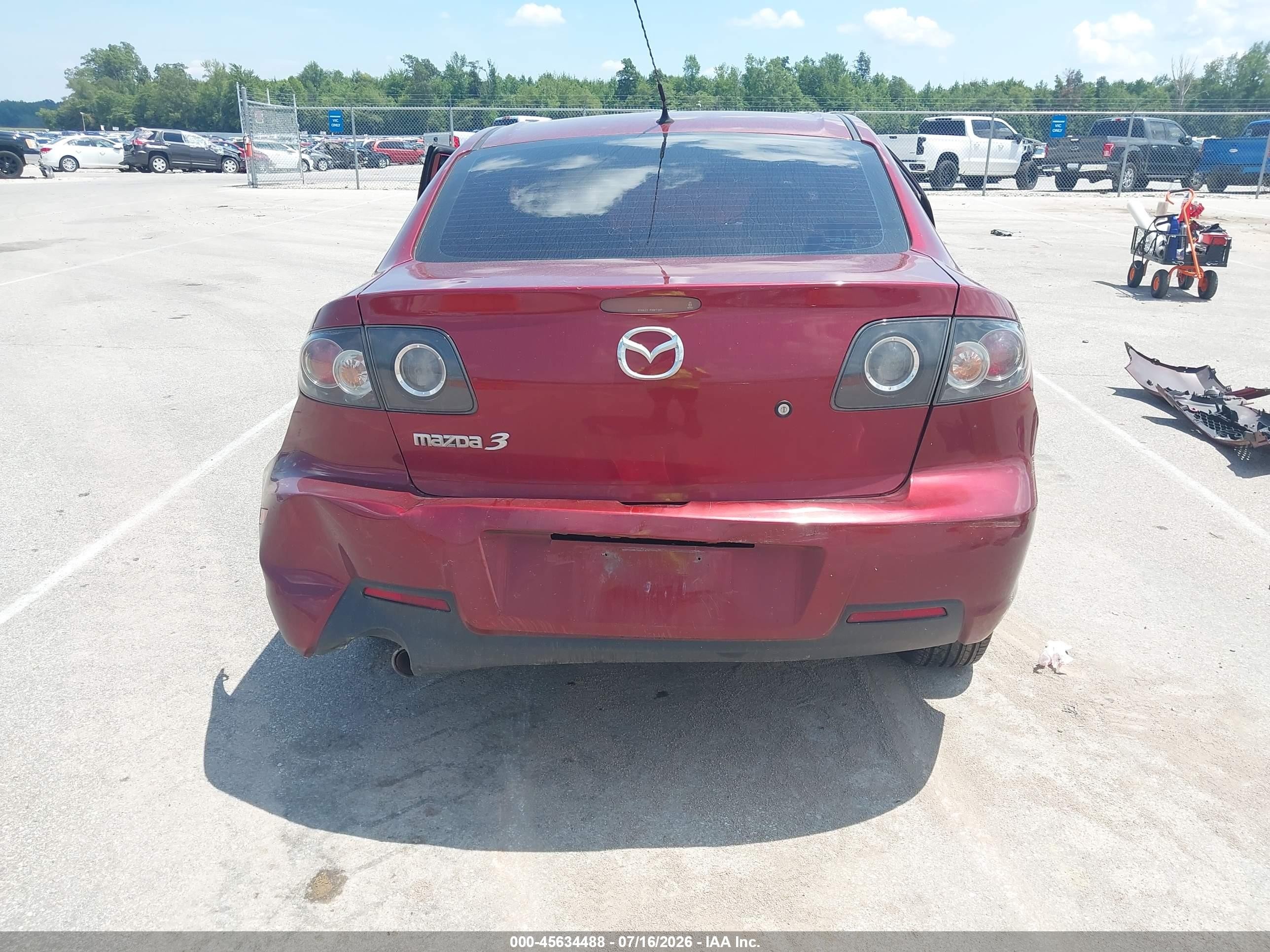 2009 Mazda Mazda3 I Maroon vin: JM1BK32F291224075