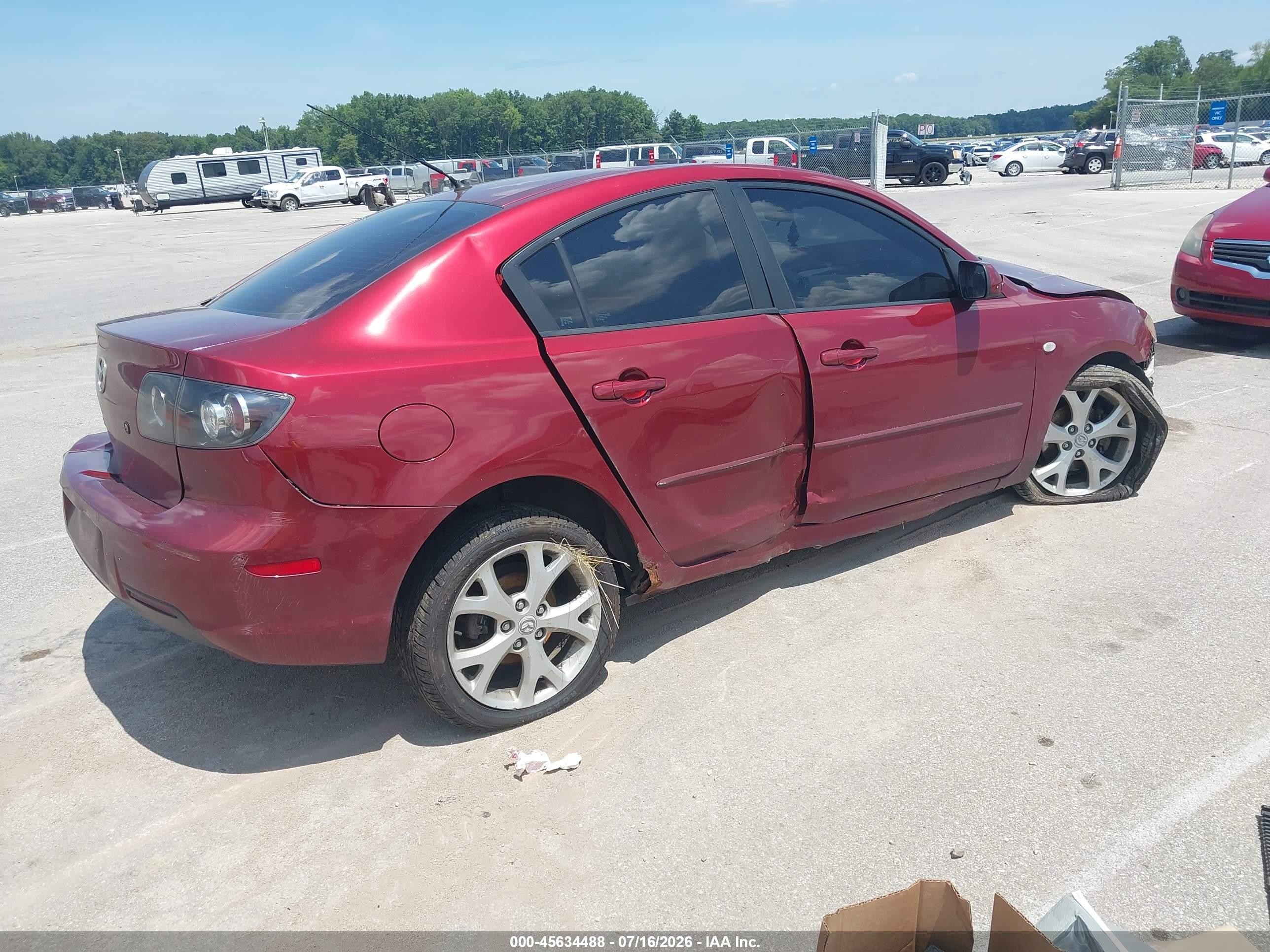 2009 Mazda Mazda3 I Maroon vin: JM1BK32F291224075