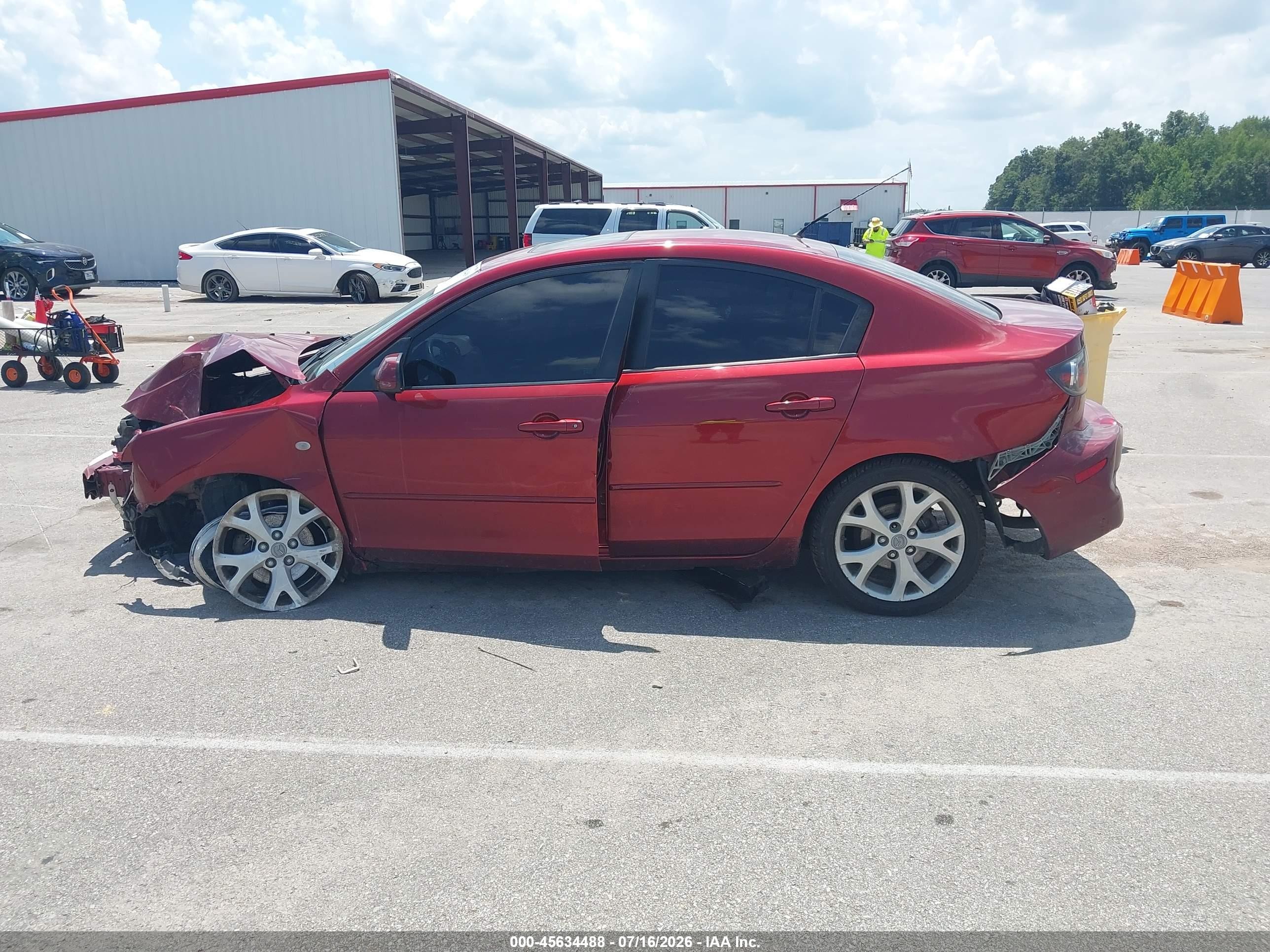 2009 Mazda Mazda3 I Maroon vin: JM1BK32F291224075