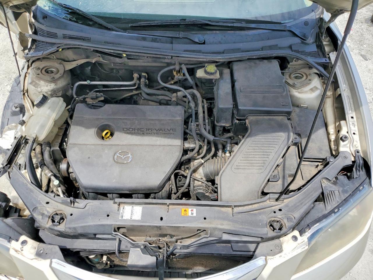 2008 Mazda 3 I Tan vin: JM1BK32F481864674