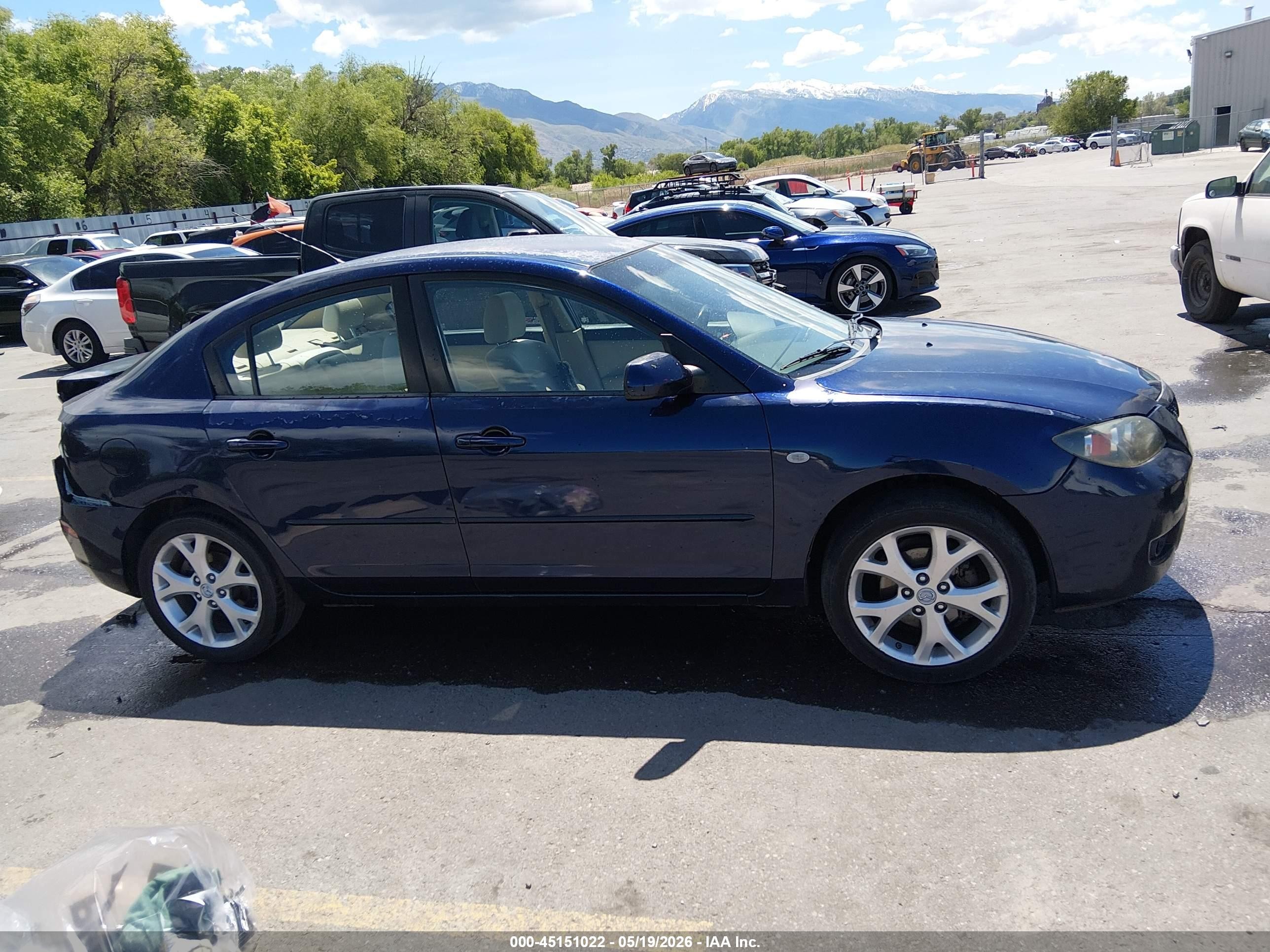 2009 Mazda Mazda3 I Blue vin: JM1BK32F591188446
