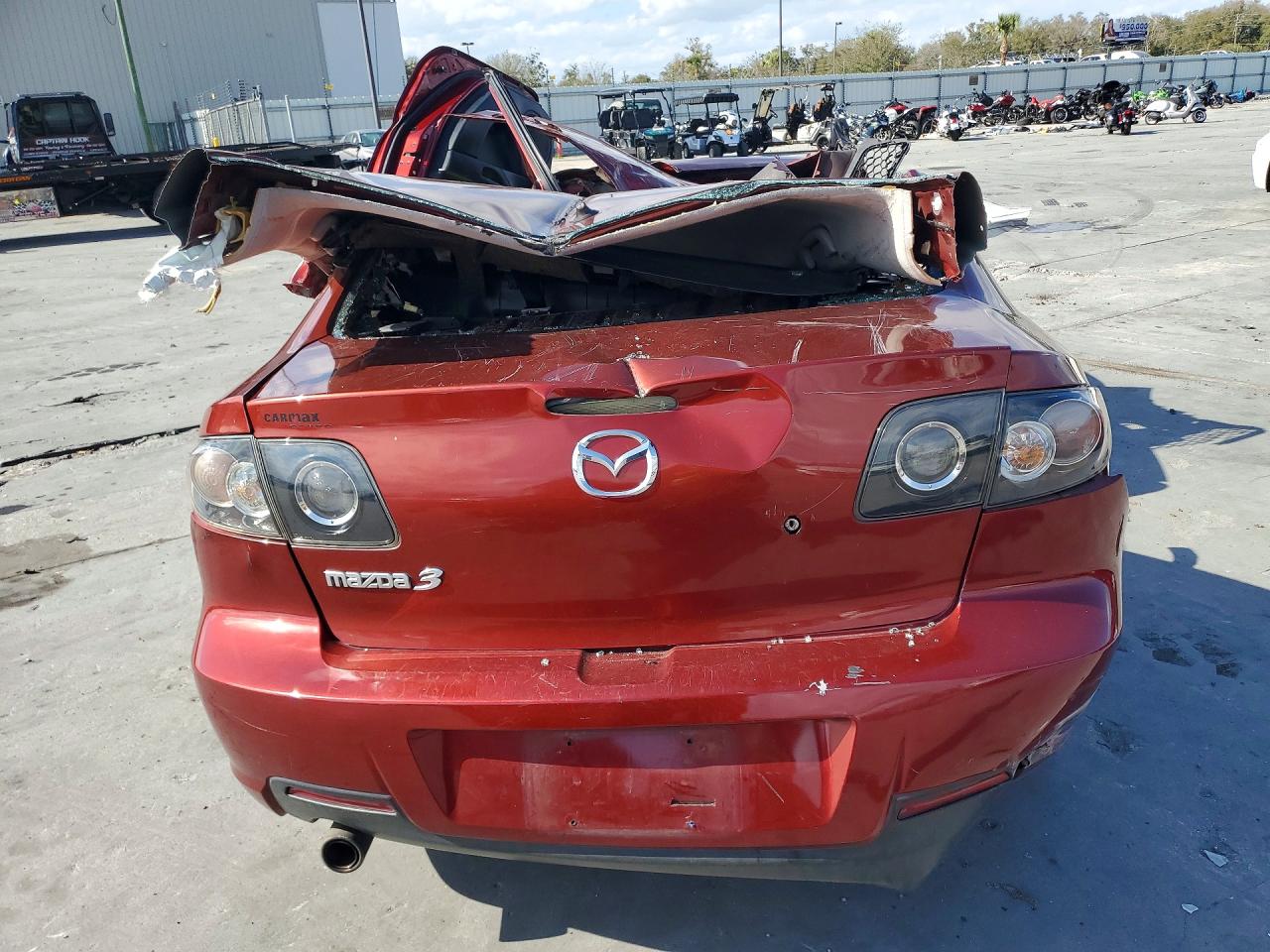 2009 Mazda 3 I Maroon vin: JM1BK32F891252561