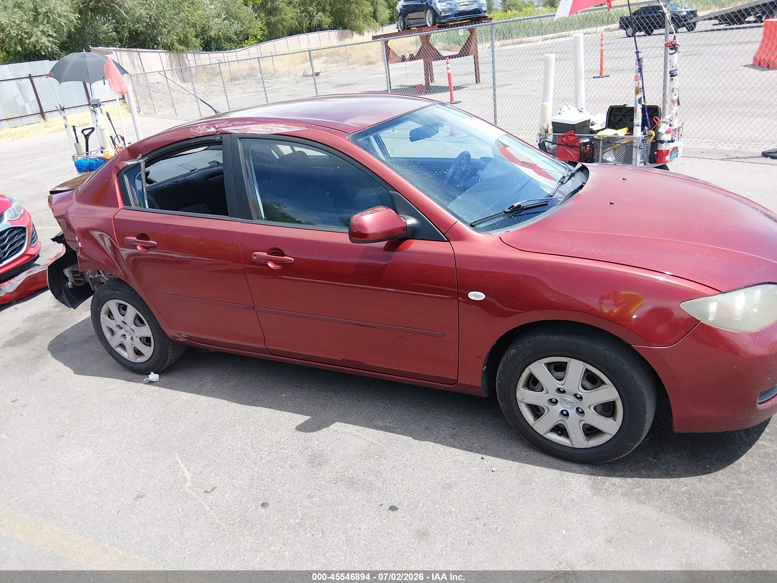 2009 Mazda Mazda3 I Sport Burgundy vin: JM1BK32F991216989