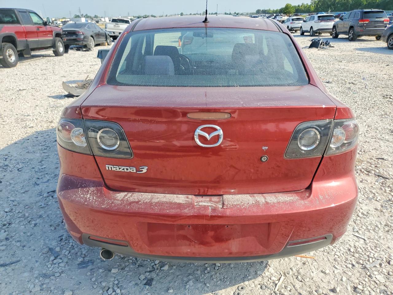 2009 Mazda 3 I Red vin: JM1BK32FX91242212