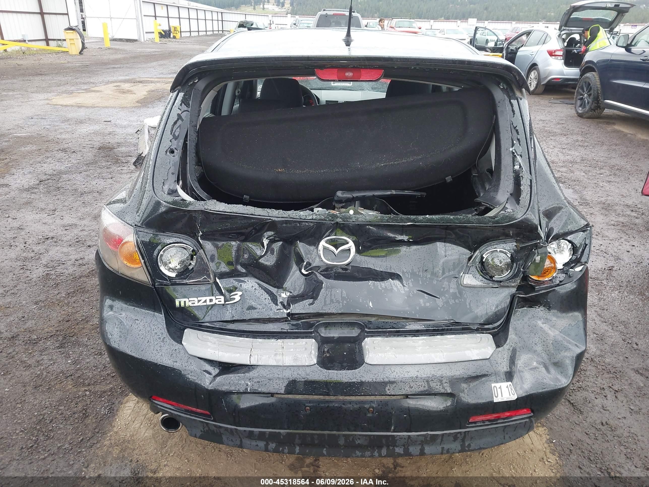 2006 Mazda Mazda3 S Touring Black vin: JM1BK343661519517