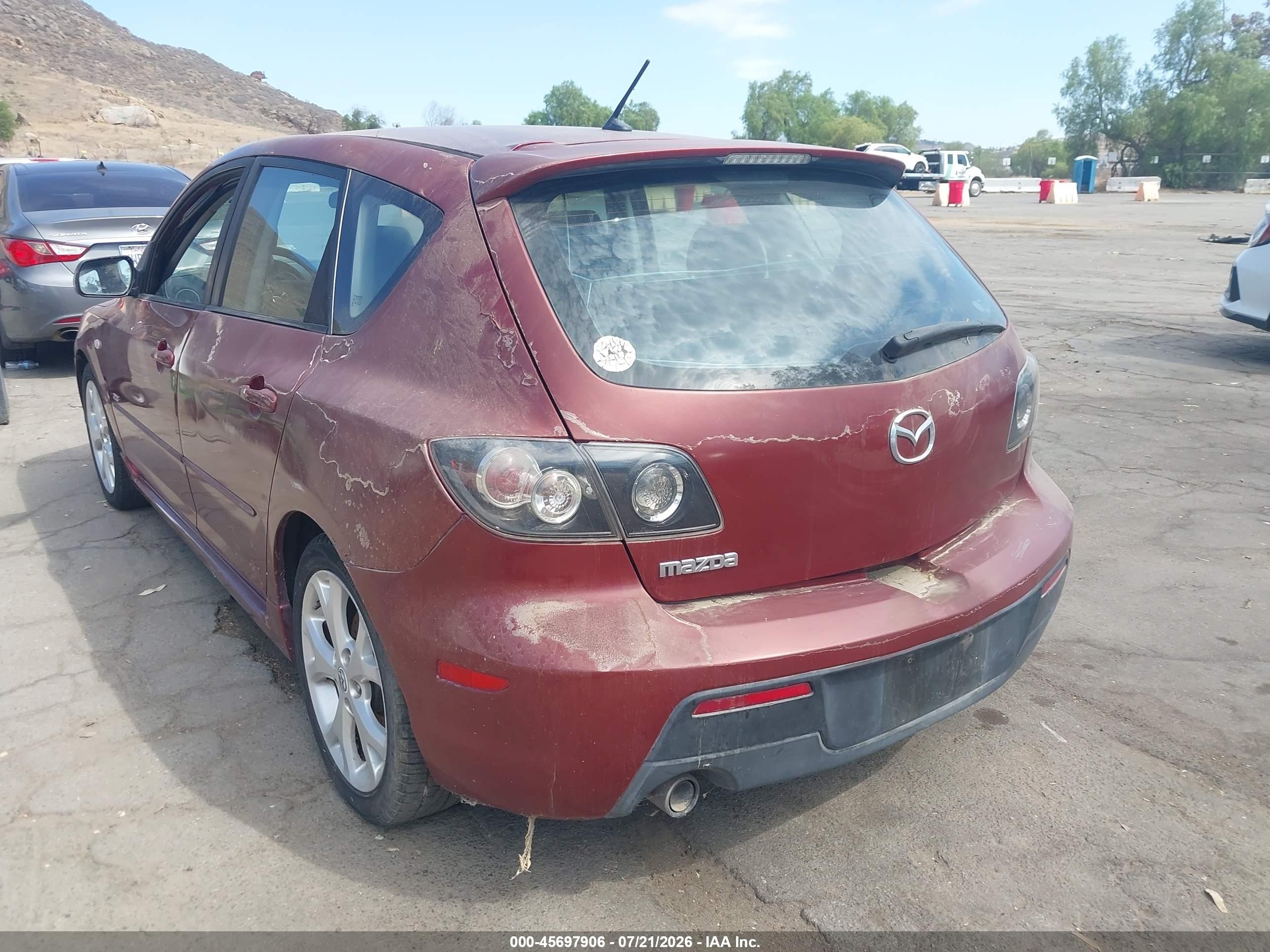 2009 Mazda Mazda3 S Touring Red vin: JM1BK344891198108