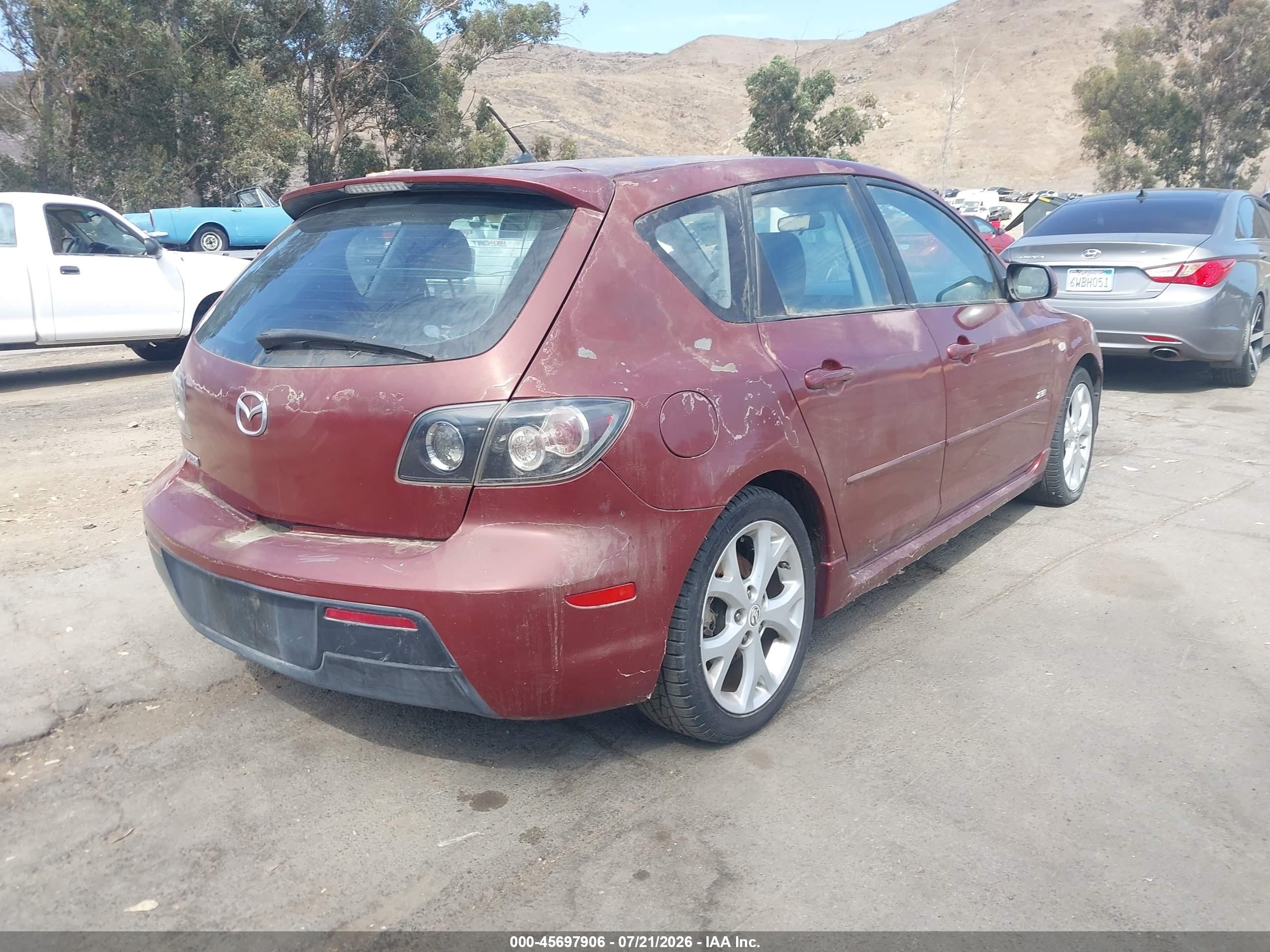 2009 Mazda Mazda3 S Touring Red vin: JM1BK344891198108