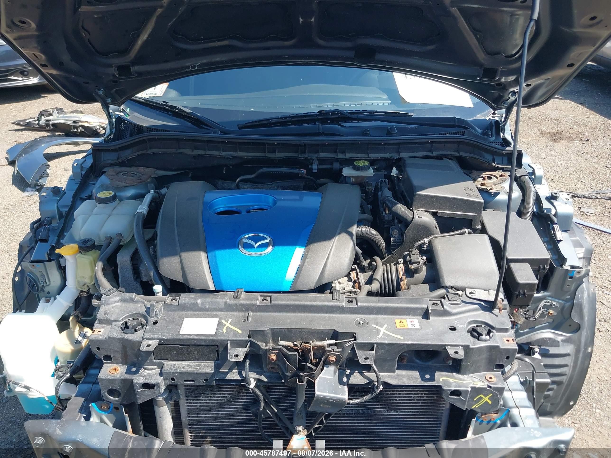 2012 Mazda Mazda3 I Touring Бирюзовый vin: JM1BL1L70C1597972