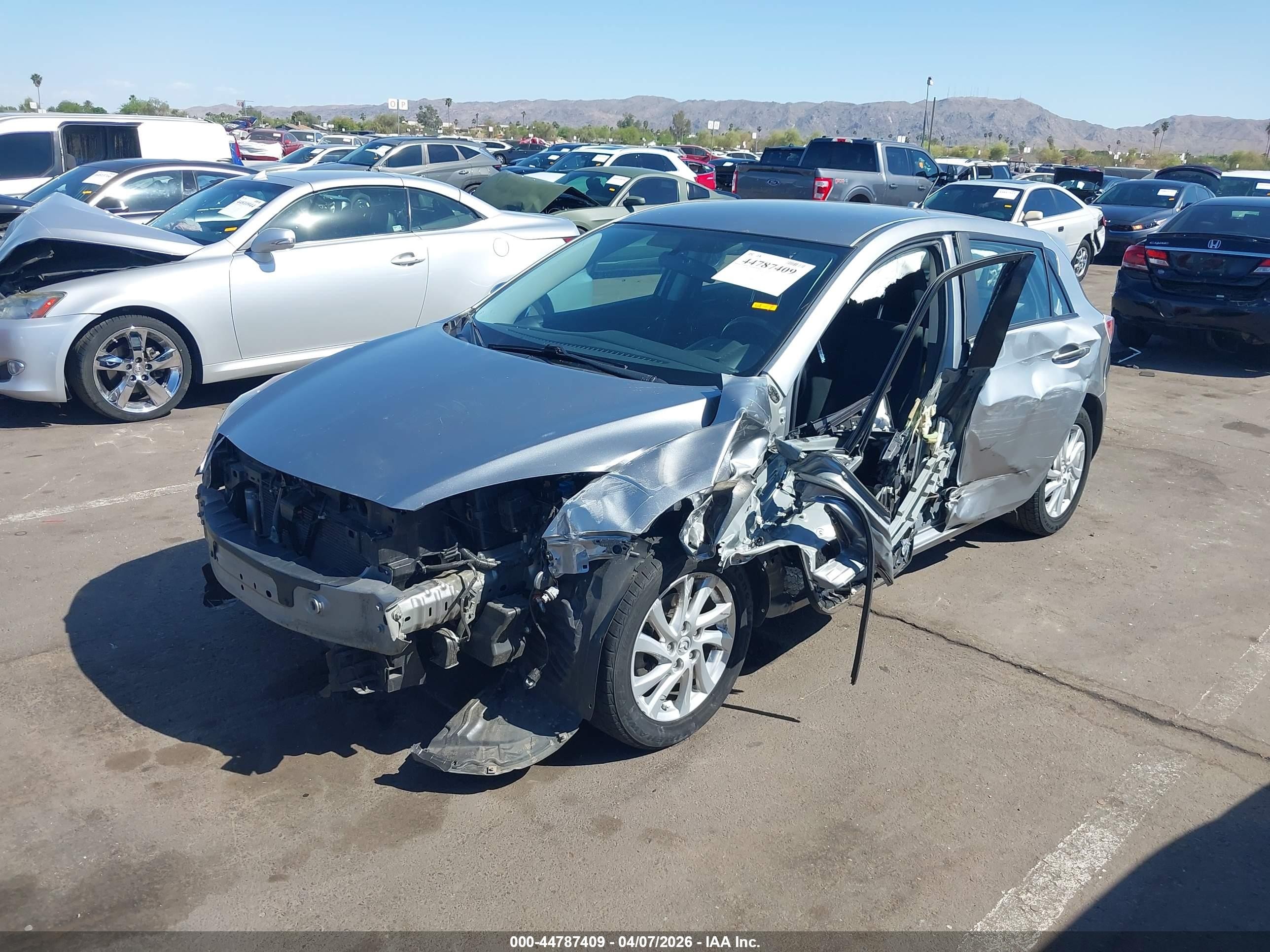 2012 Mazda Mazda3 I Touring Silver vin: JM1BL1L81C1614108